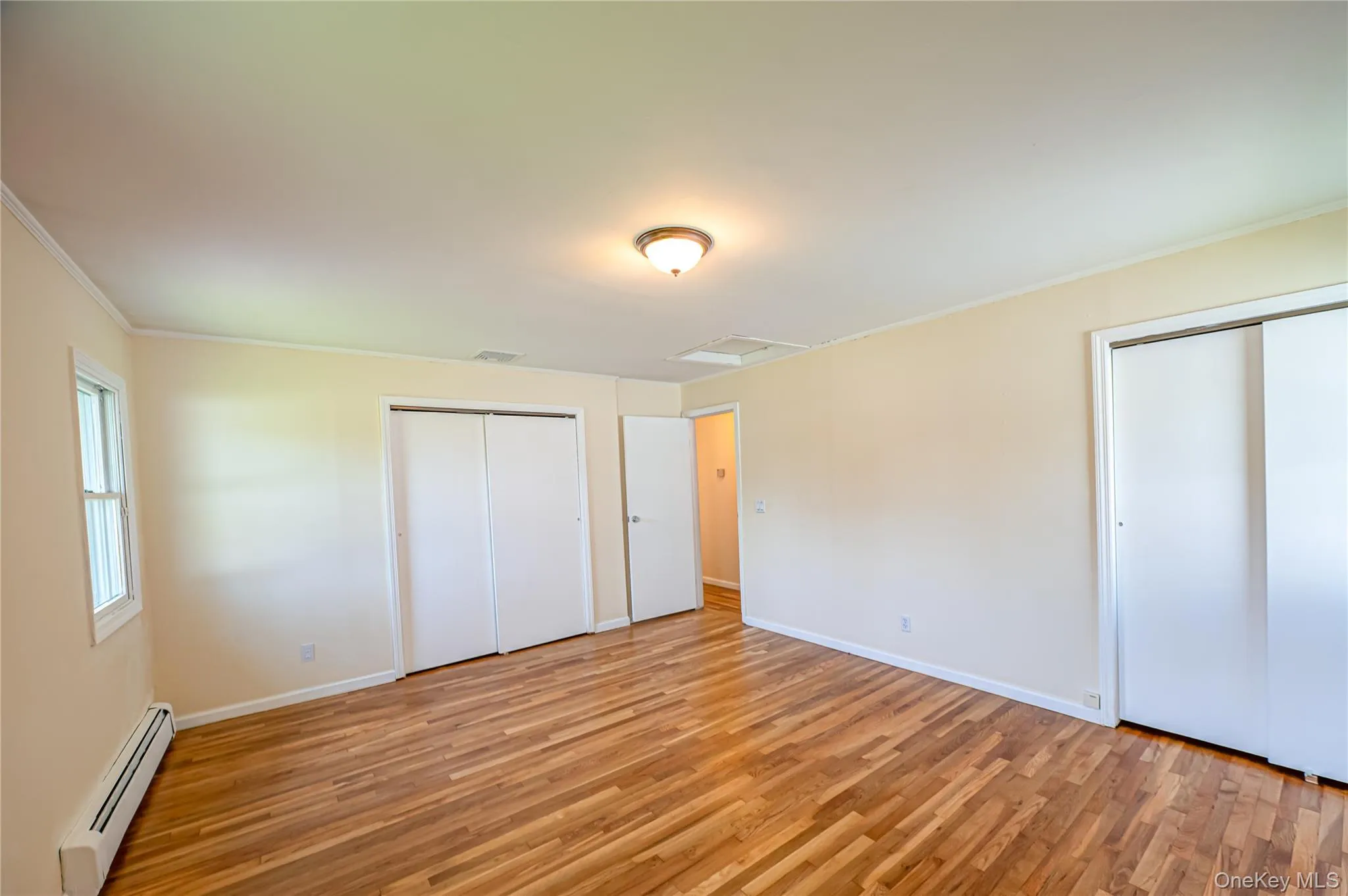 Primary Bedroom with 2 double closete Primary Bedroom with 2 double closete