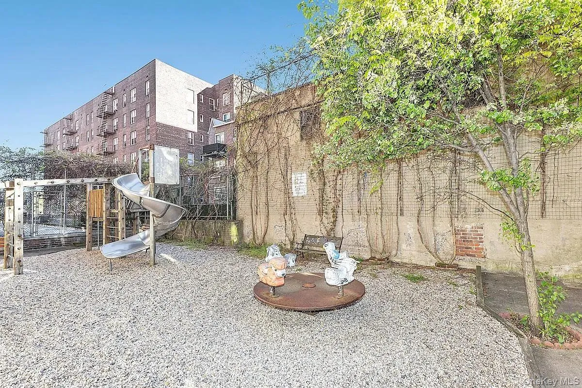 View of yard featuring a playground View of yard featuring a playground