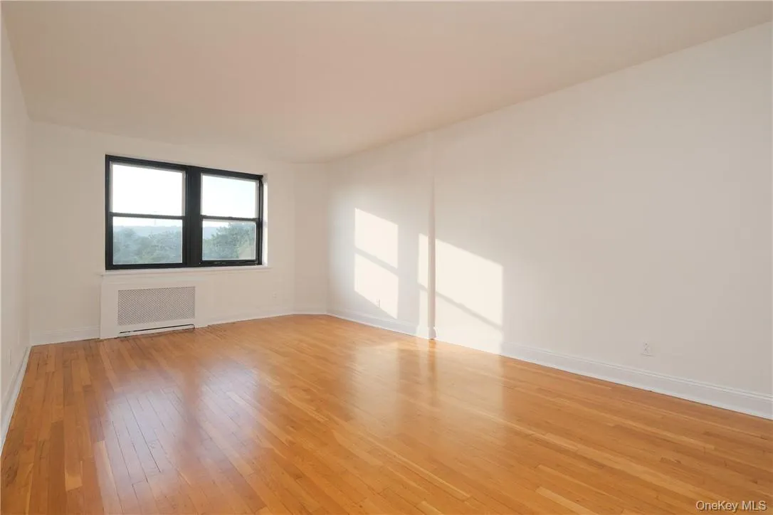 APT. 5F - Living Room w/ west exposure and Hudson River / Palisades view. APT. 5F - Living Room w/ west exposure and Hudson River / Palisades view.