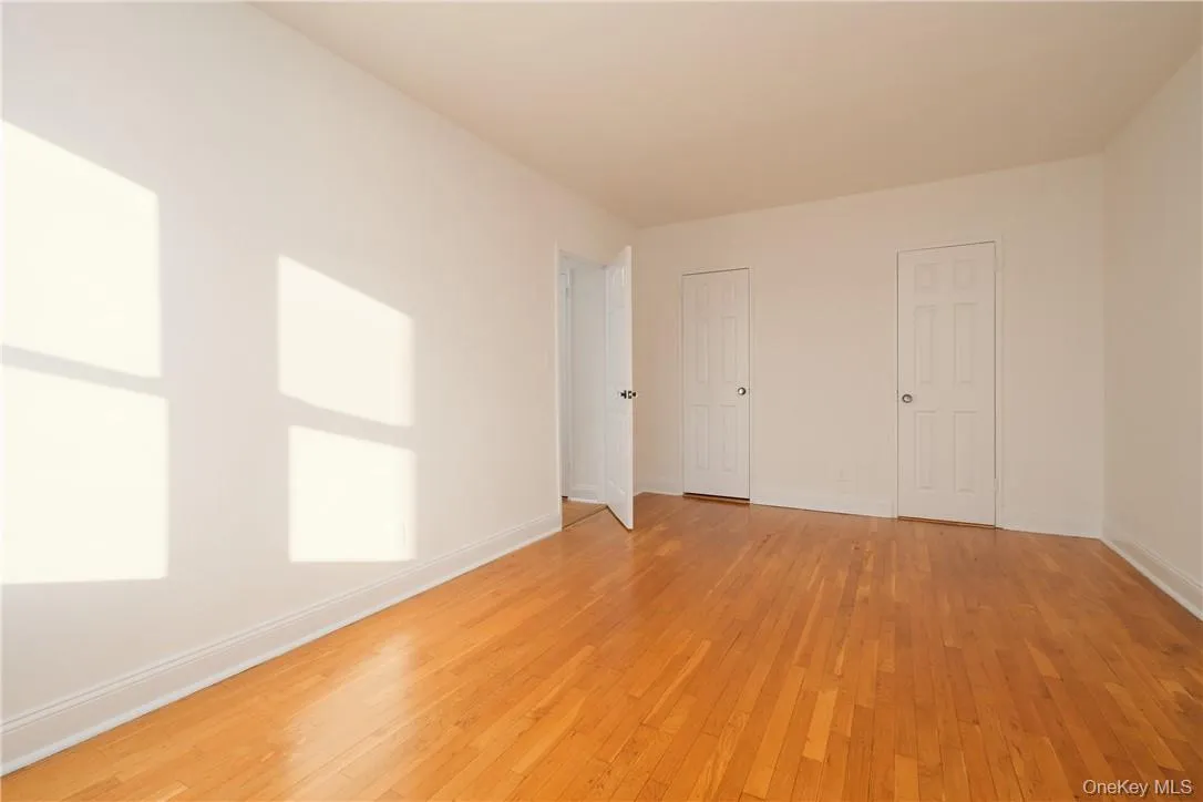 APT. 5F - Primary Bedroom w/ (2) closets. APT. 5F - Primary Bedroom w/ (2) closets.