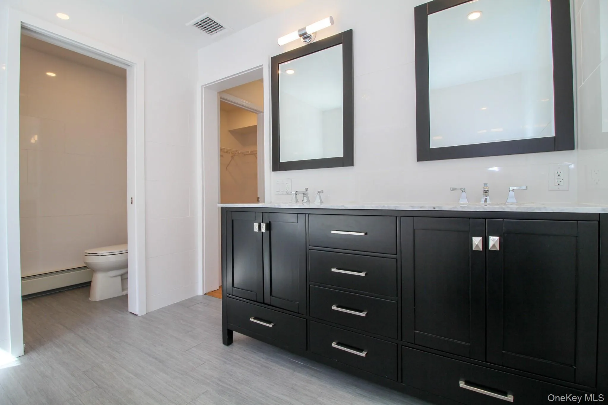 Primary bathroom with double sink vanity Primary bathroom with double sink vanity