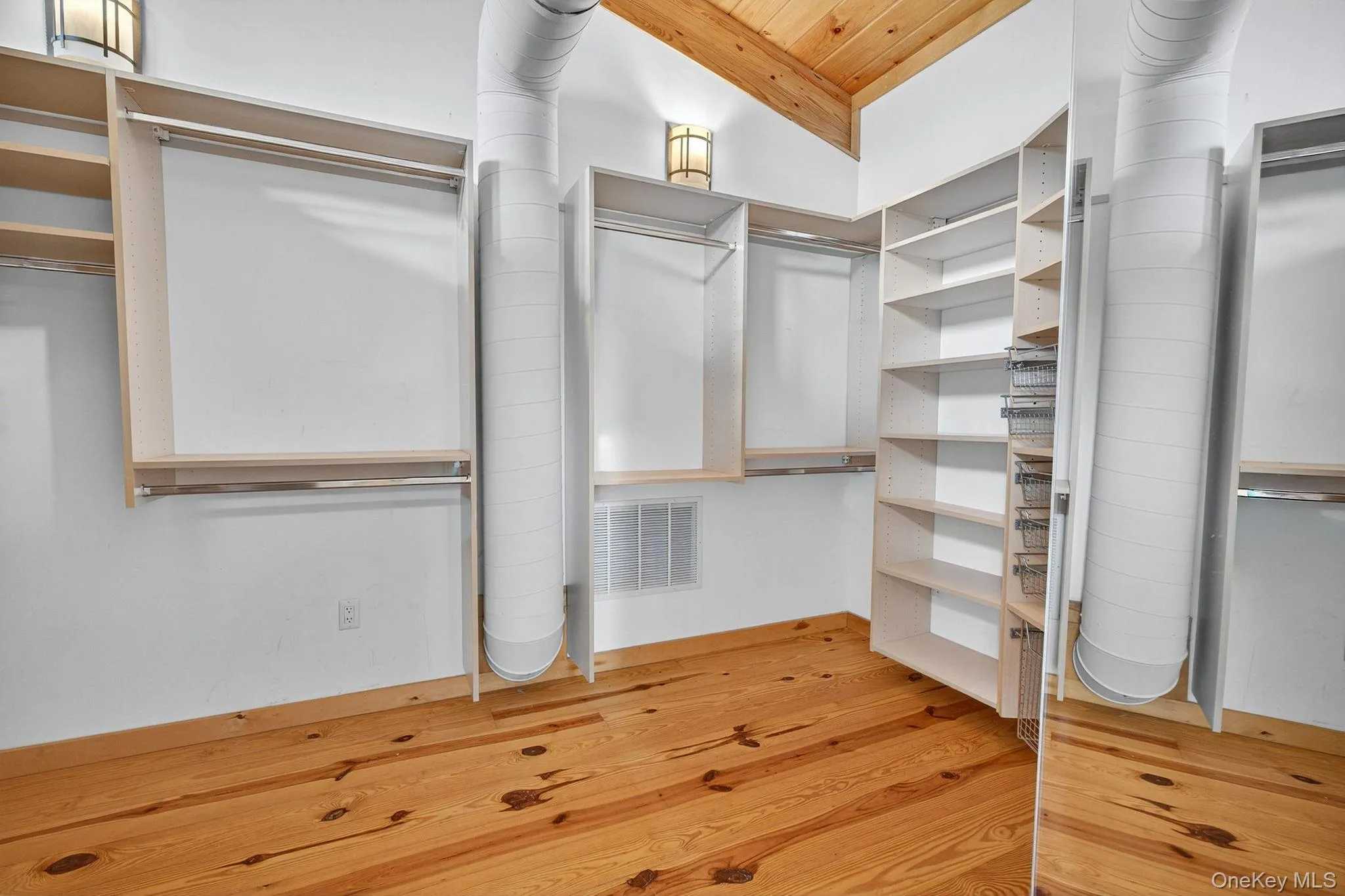 Primary Bedroom Walk-In Closet Primary Bedroom Walk-In Closet