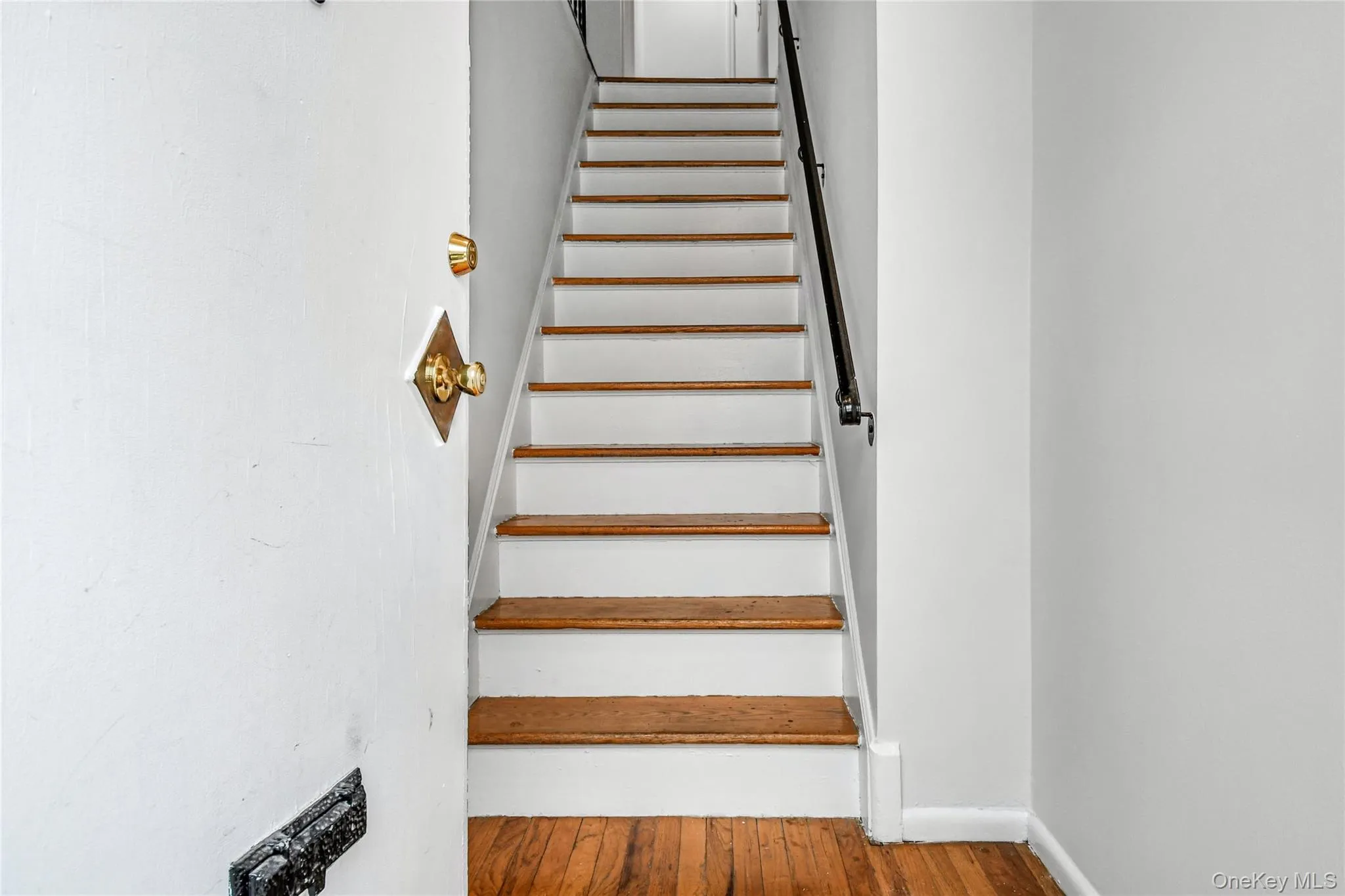 Entry Door with vestibule and then set of interior Stairs Entry Door with vestibule and then set of interior Stairs