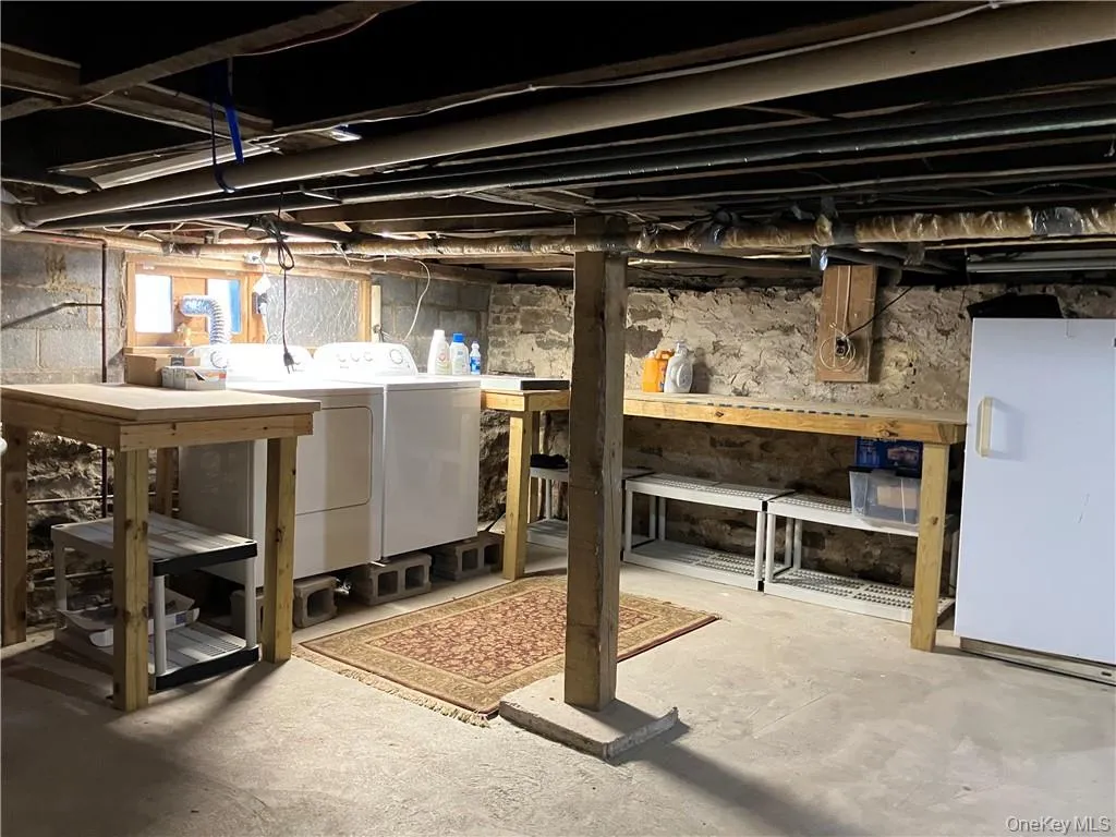 Basement featuring separate washer and dryer Basement featuring separate washer and dryer