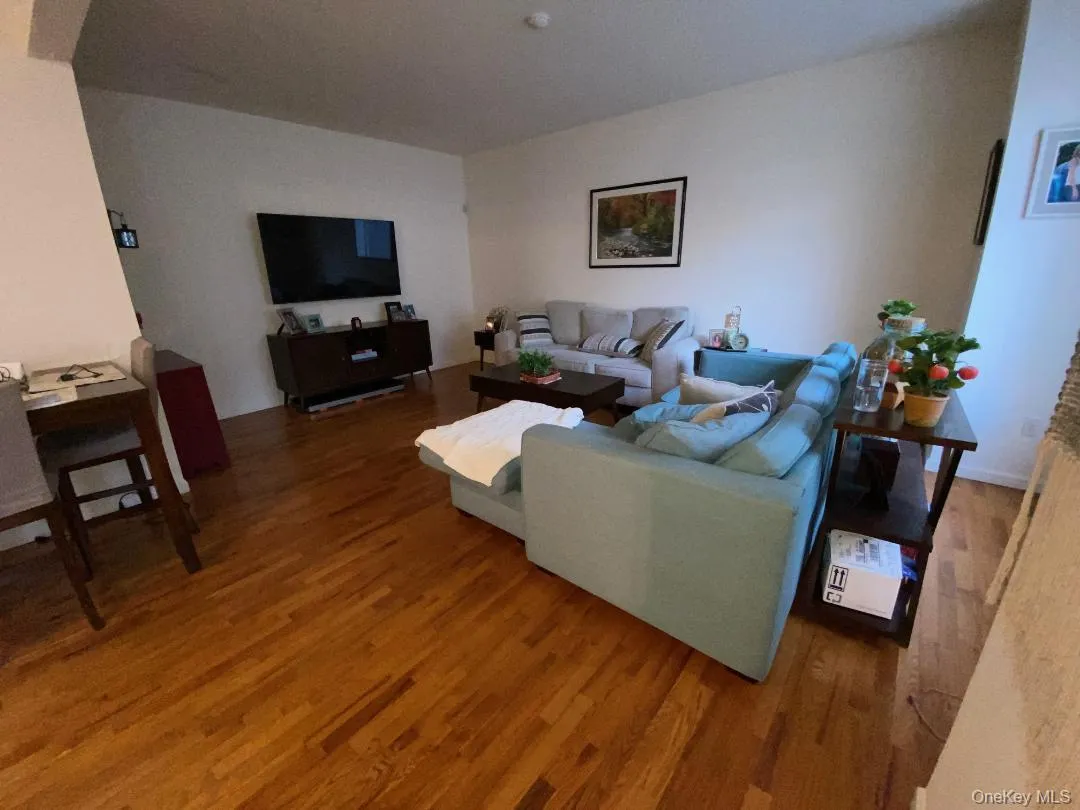 There's a very spacious living room which opens to the dining area and eat in kitchen - with beautiful oak floors There's a very spacious living room which opens to the dining area and eat in kitchen - with beautiful oak floors