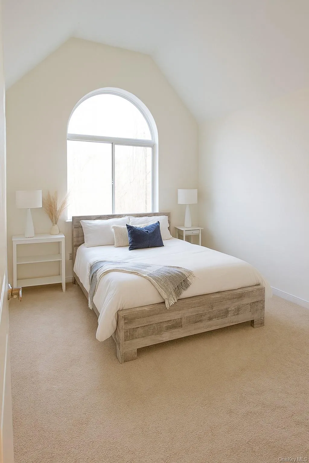 Spacious 2nd bedroom which features high ceilings and an oversized double closet (virtually staged) Spacious 2nd bedroom which features high ceilings and an oversized double closet (virtually staged)