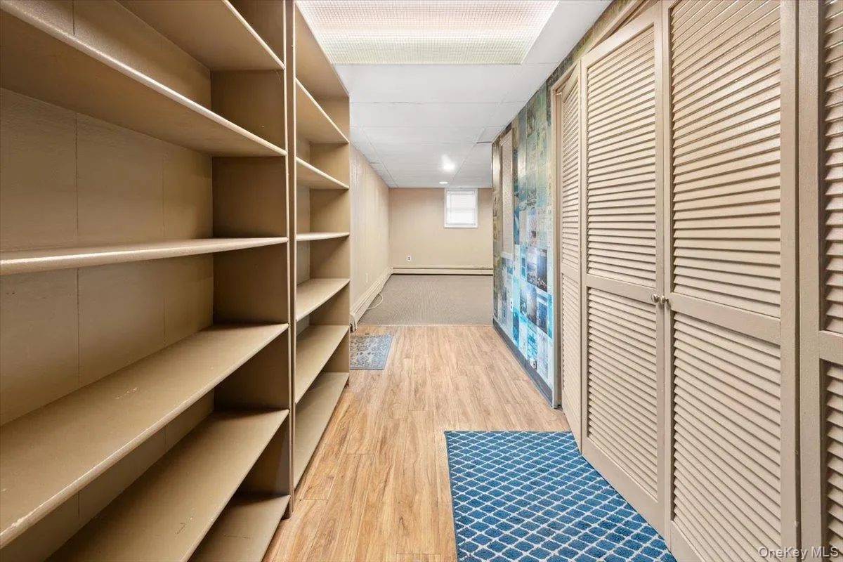 downstairs leads you to the garage, laundry room, outside to the trex deck, and family room with a wood-burning stove. downstairs leads you to the garage, laundry room, outside to the trex deck, and family room with a wood-burning stove.