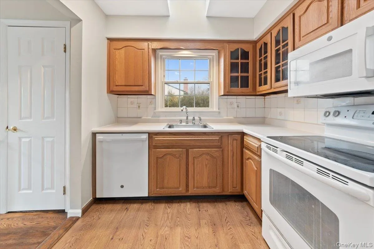 Kitchen also features a skylight that brings in plenty of light Kitchen also features a skylight that brings in plenty of light