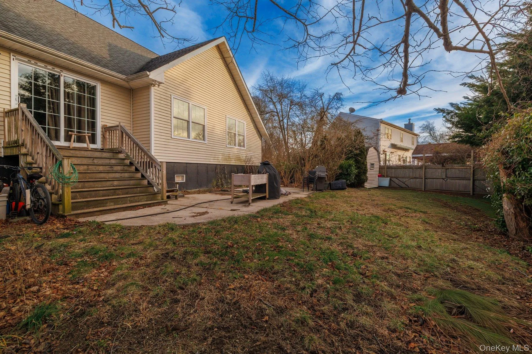 Rear view of house featuring a patio Rear view of house featuring a patio
