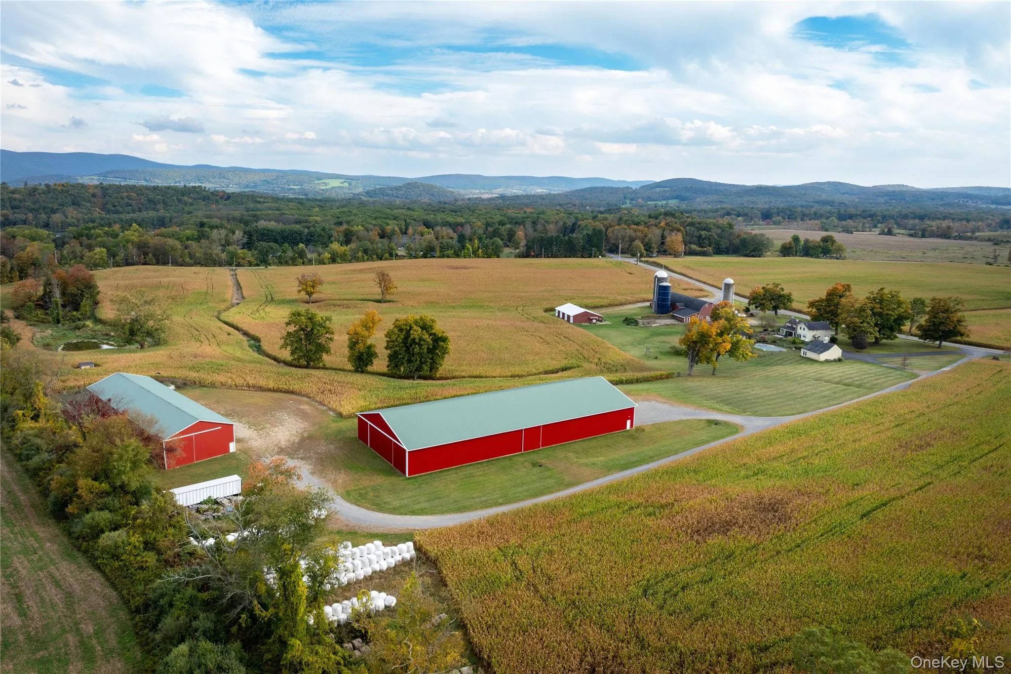 Backdrop for the farm, riding area and hay barn in the fore ground Backdrop for the farm, riding area and hay barn in the fore ground