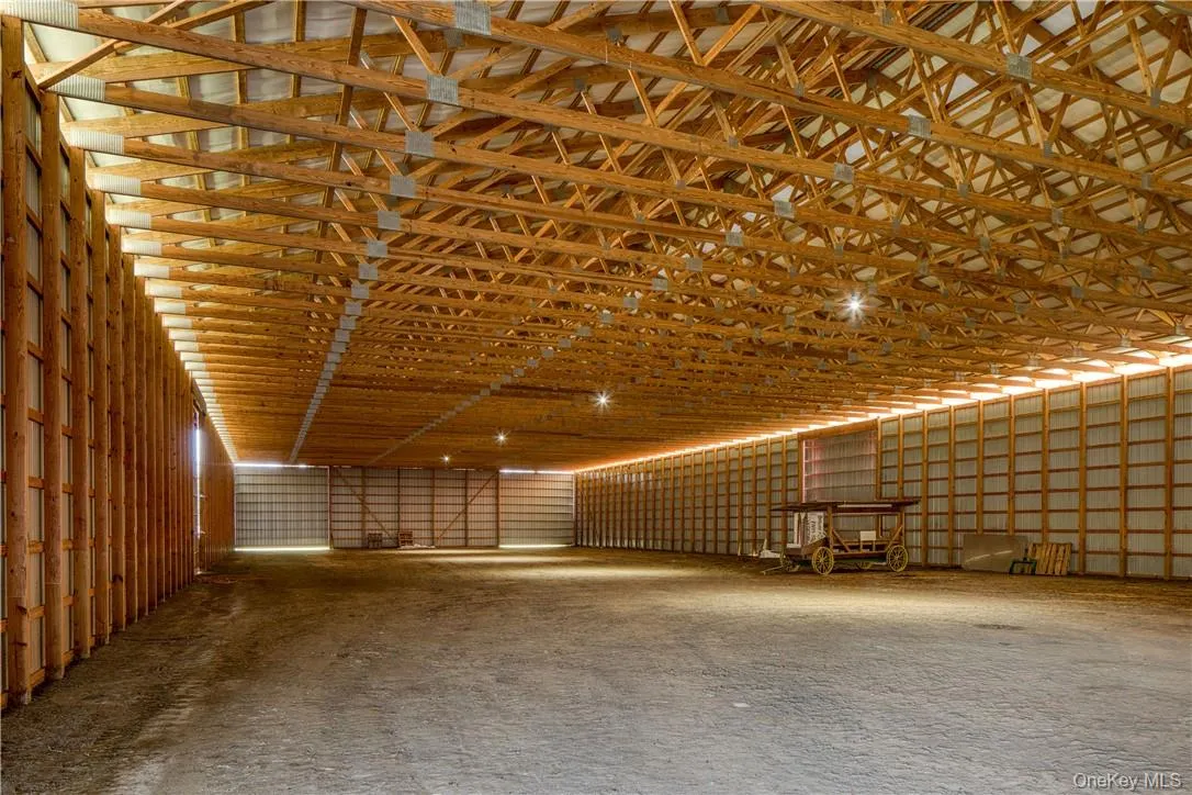 Equipment barn, 80x200, could be turned into a indoor riding arena or storage for cars Equipment barn, 80x200, could be turned into a indoor riding arena or storage for cars