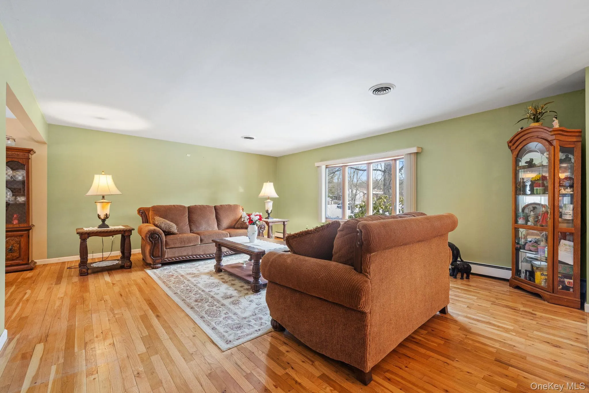 Large living room with bay window Large living room with bay window