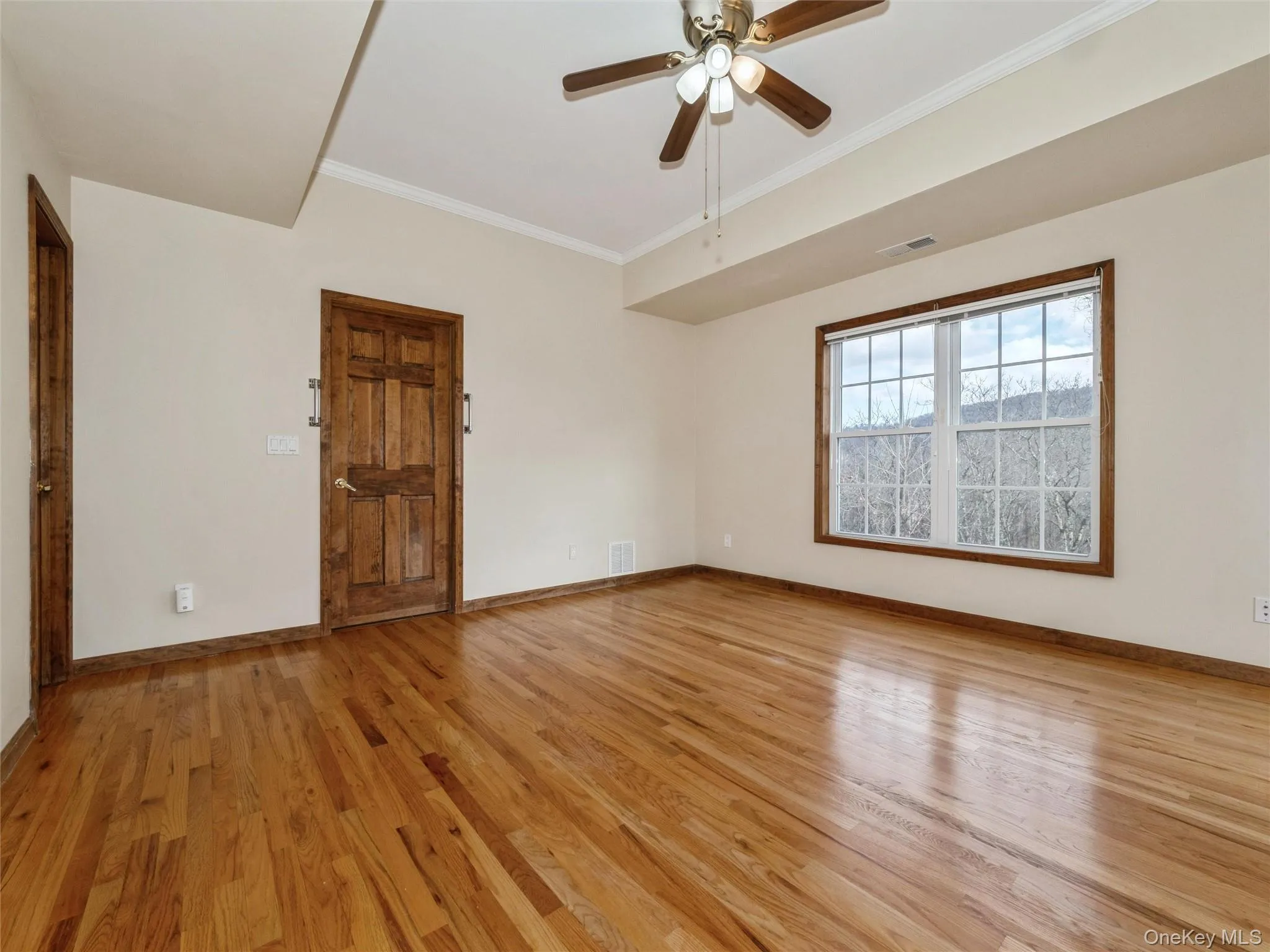 Primary BR, hardwood flrs, ceiling fan Primary BR, hardwood flrs, ceiling fan