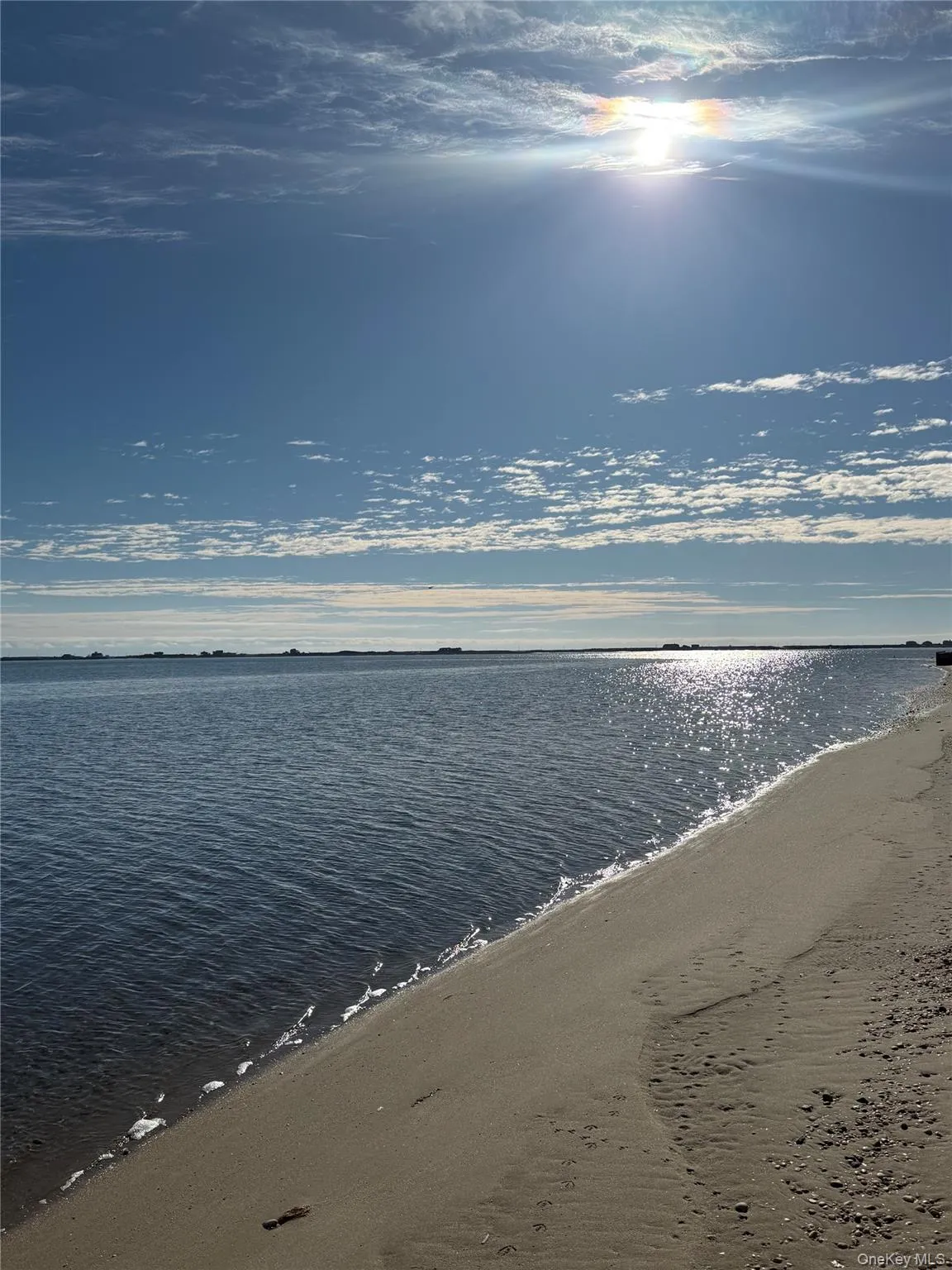 Property view of water with a view of the beach Property view of water with a view of the beach