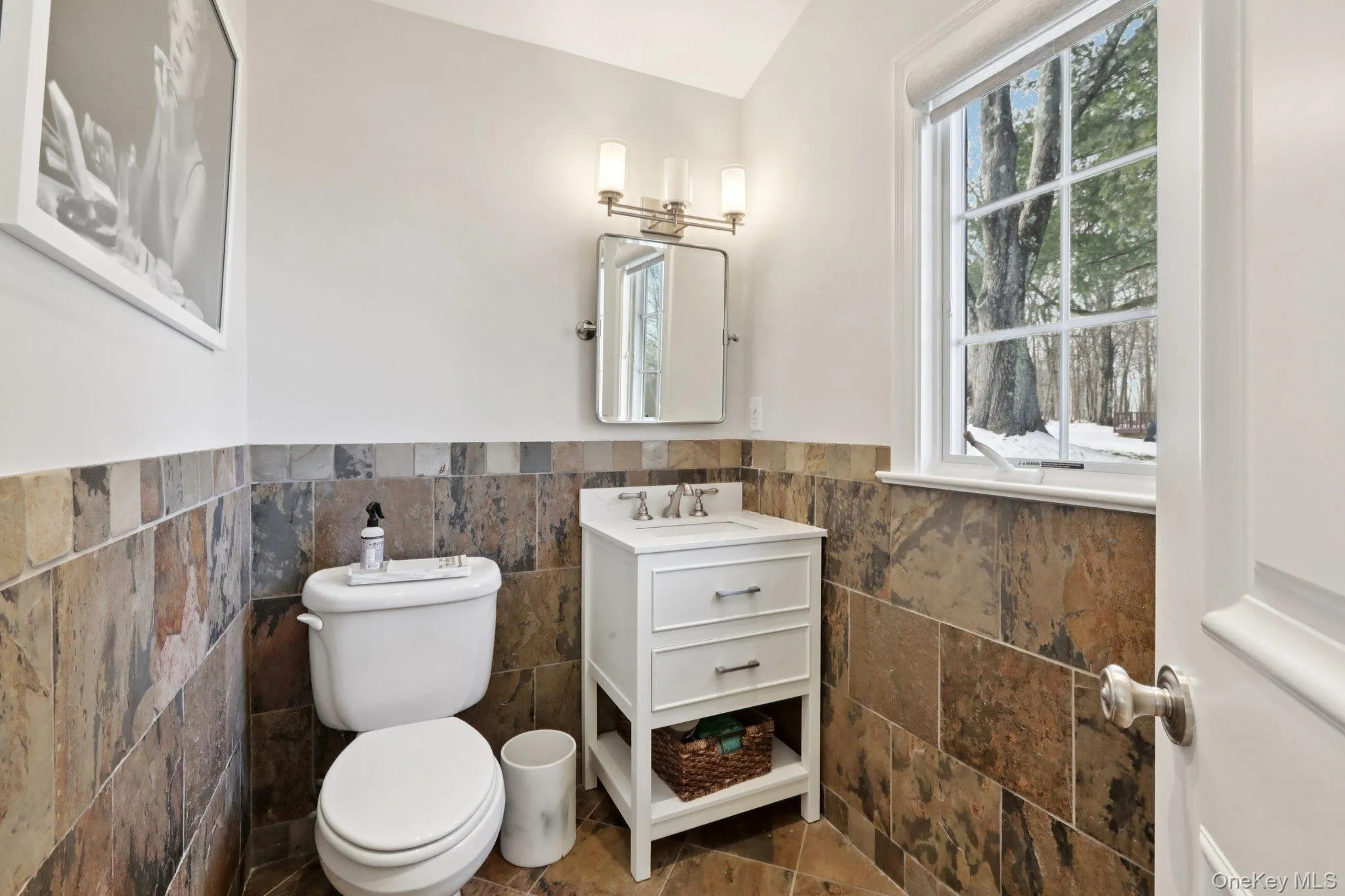 Half Bath on Main Level with heated floors Half Bath on Main Level with heated floors