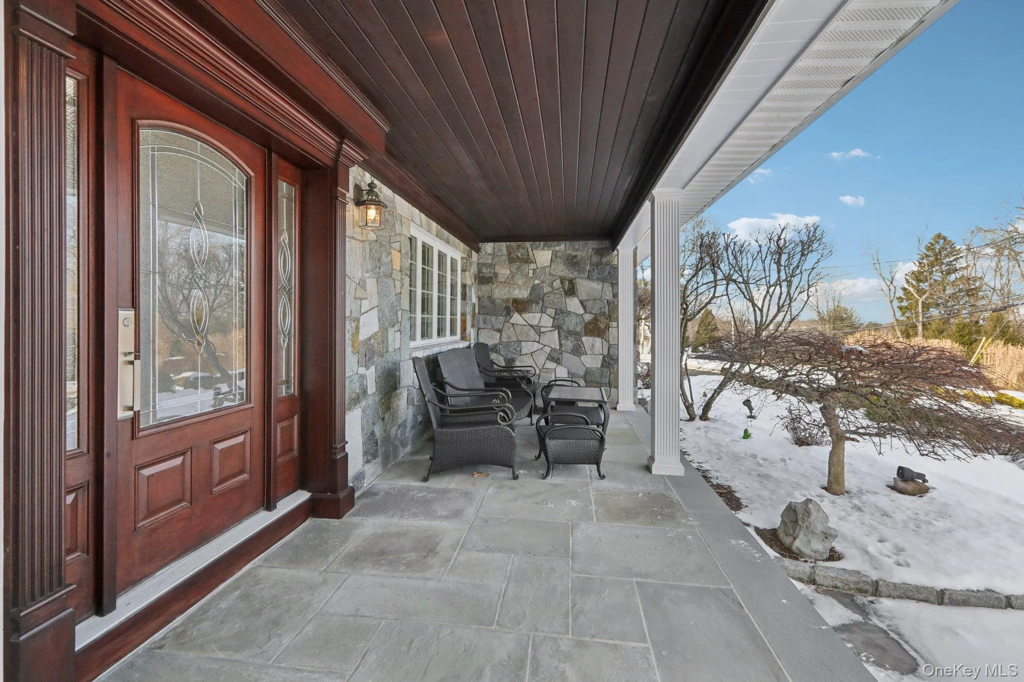 Bluestone covered patio and Brazilian cherry wood front door Bluestone covered patio and Brazilian cherry wood front door
