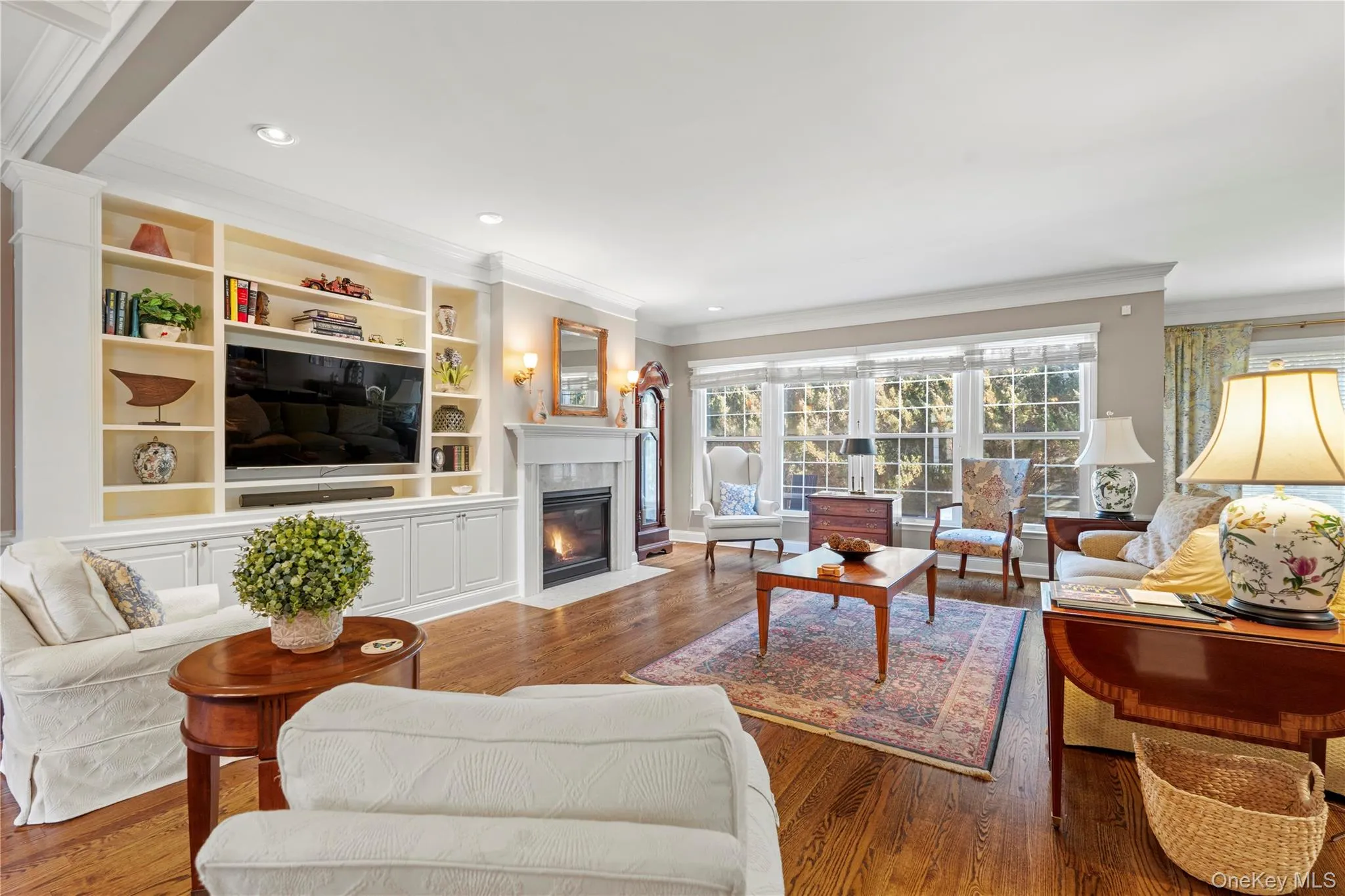 Easy first floor living - Wonderful open floor plan with beautiful built in cabinetry and gas fireplace. Easy first floor living - Wonderful open floor plan with beautiful built in cabinetry and gas fireplace.