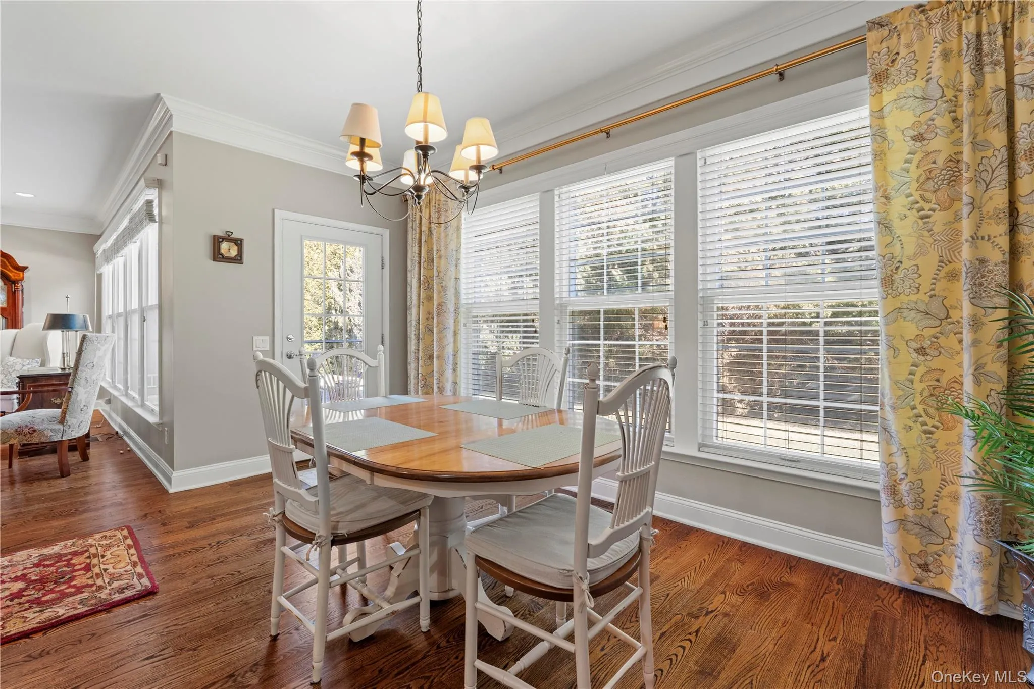 Cozy breakfast nook with rear yard views Cozy breakfast nook with rear yard views