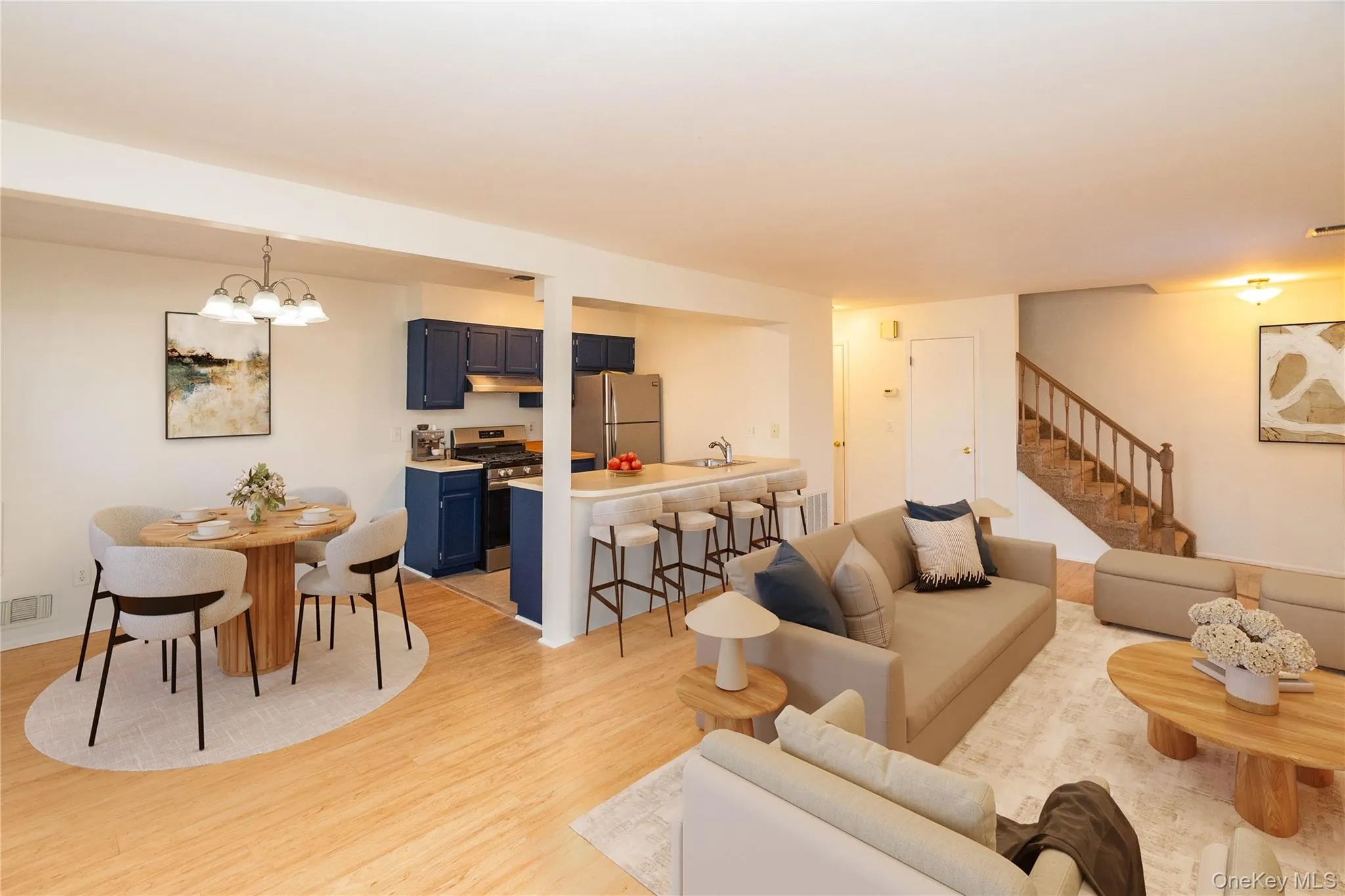 virtually staged view of living room, dining area and kitchen virtually staged view of living room, dining area and kitchen