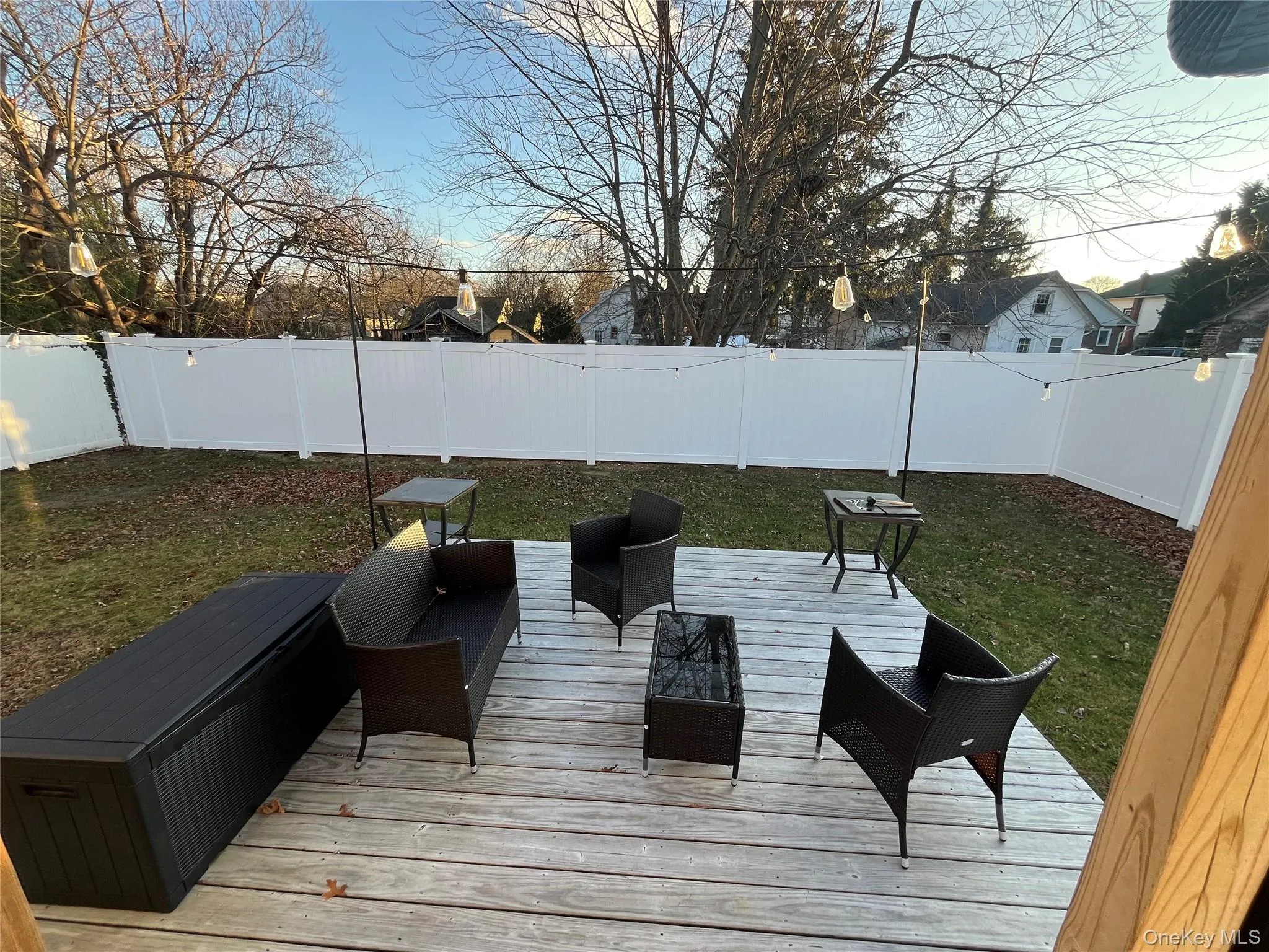 Back Deck with a fenced backyard and outdoor lounge area Back Deck with a fenced backyard and outdoor lounge area