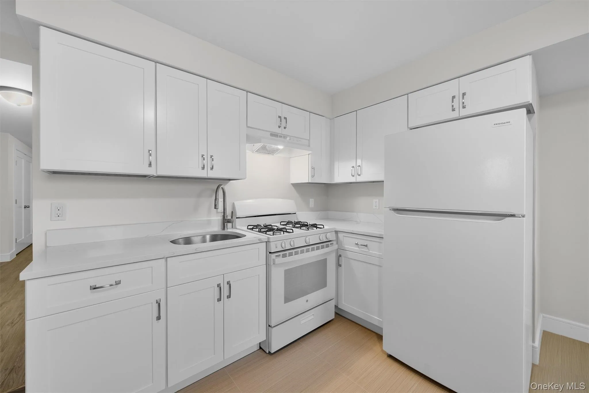 Kitchen with white appliances Kitchen with white appliances