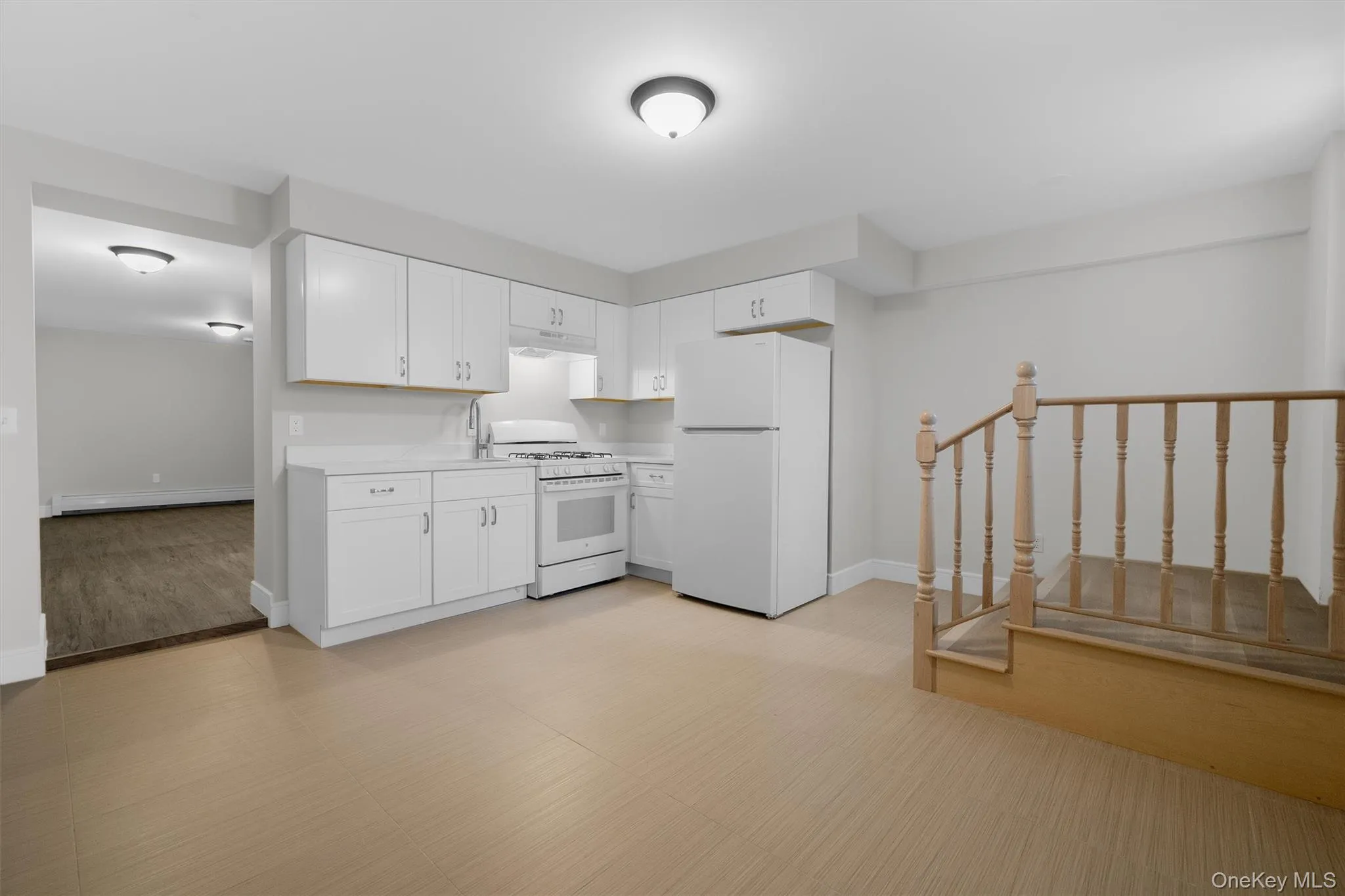 Renovated Kitchen with door to yard Renovated Kitchen with door to yard