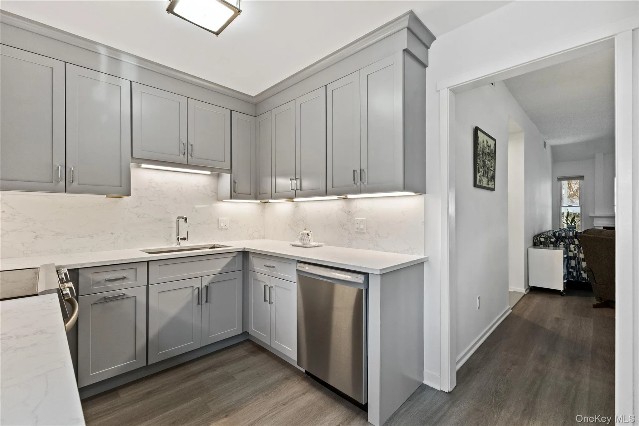 Kitchen opens to dining area and living room. Kitchen opens to dining area and living room.