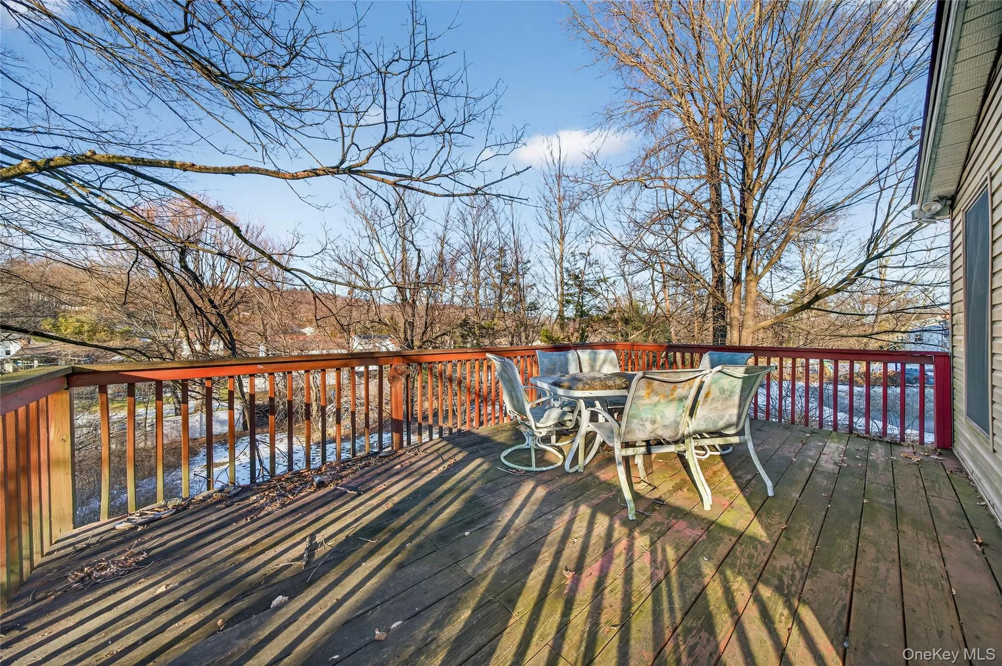 Wooden deck with outdoor dining space Wooden deck with outdoor dining space