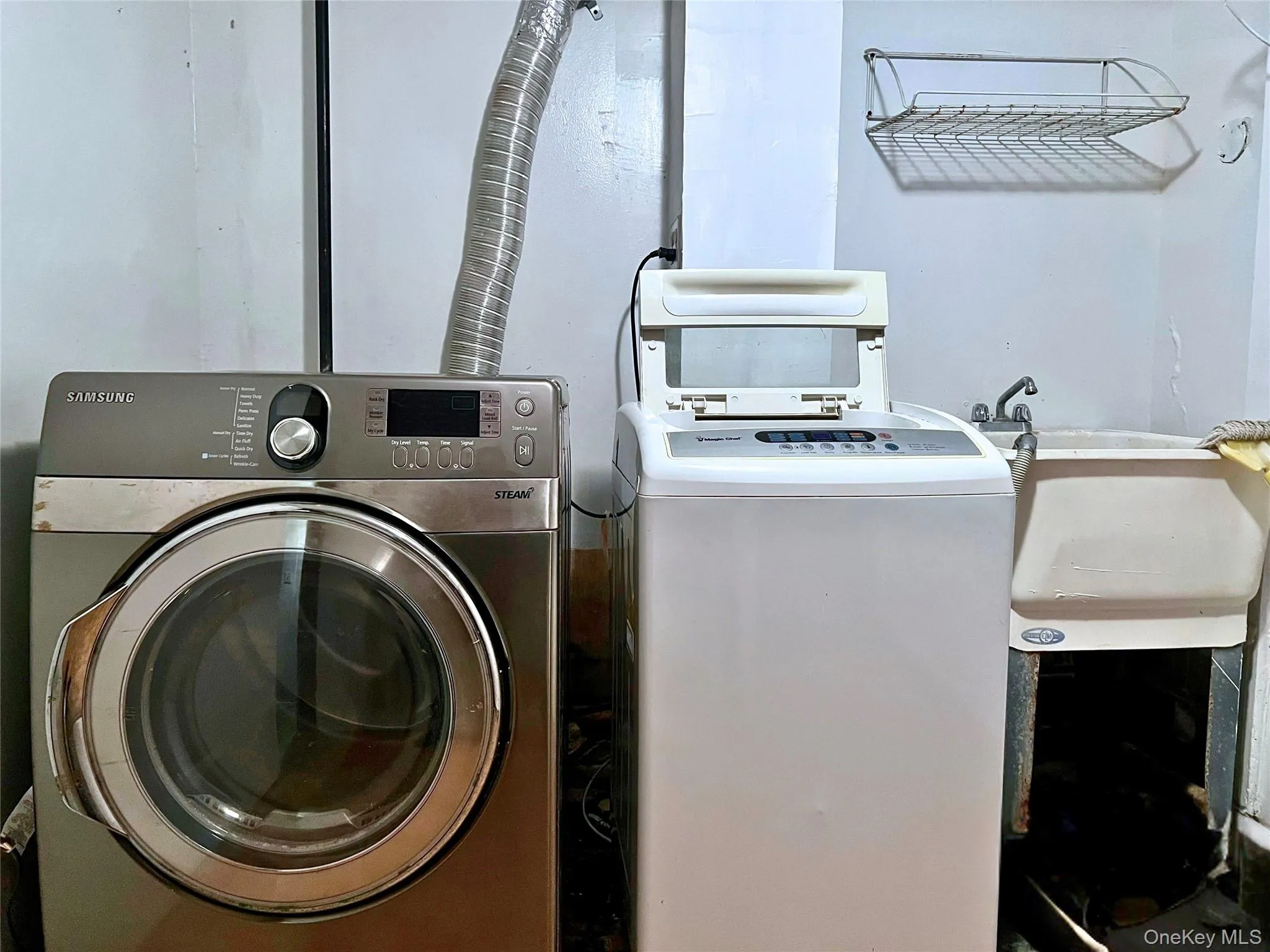 Laundry room featuring independent washer and dryer Laundry room featuring independent washer and dryer