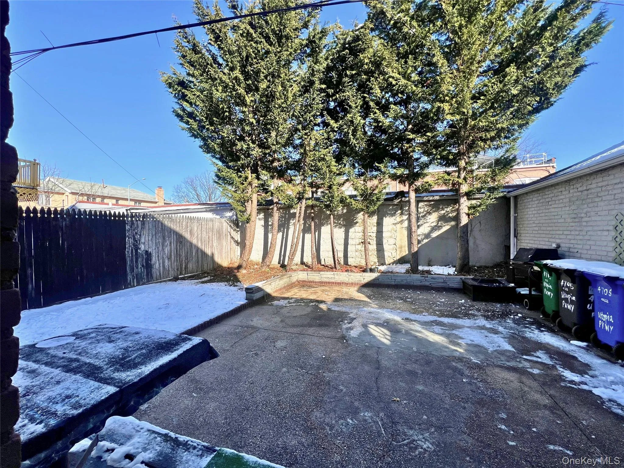 Fenced backyard featuring a patio area Fenced backyard featuring a patio area