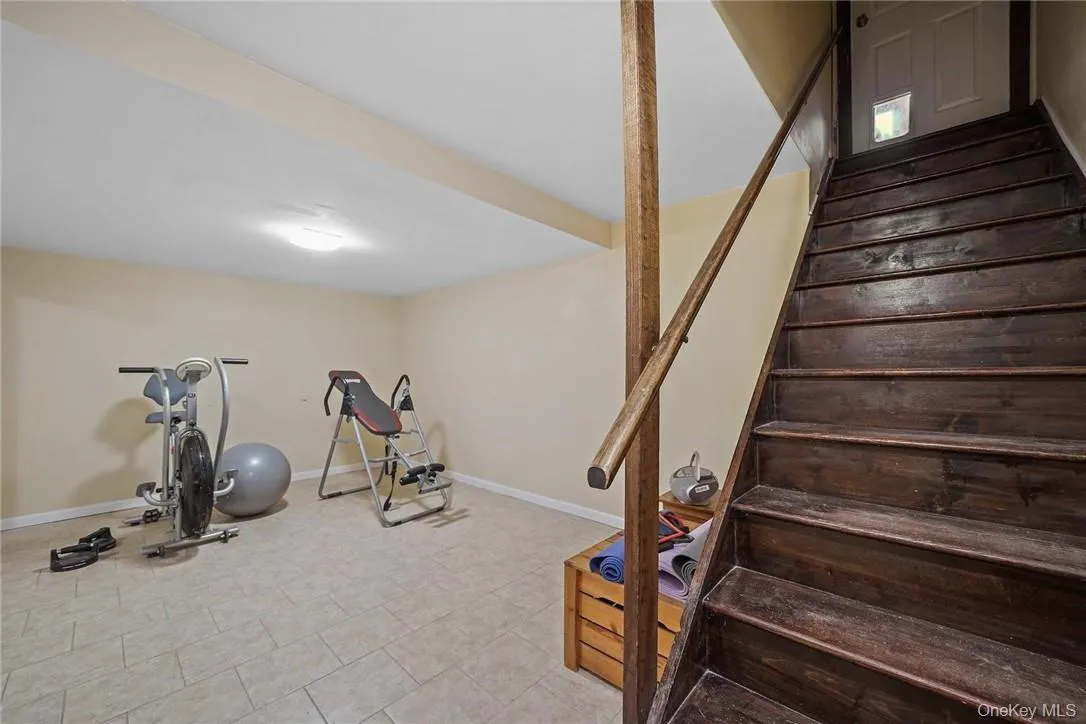 Exercise area featuring baseboards Exercise area featuring baseboards