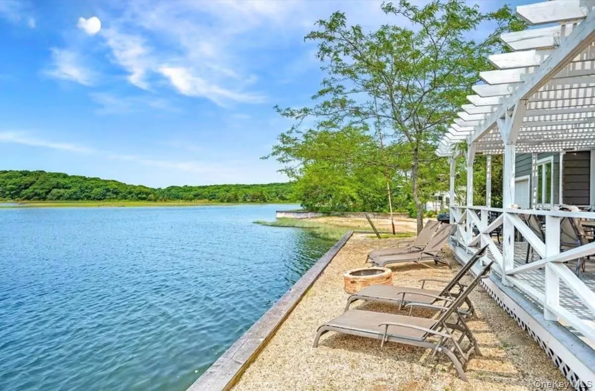 sandy lounge area overlooking the water sandy lounge area overlooking the water