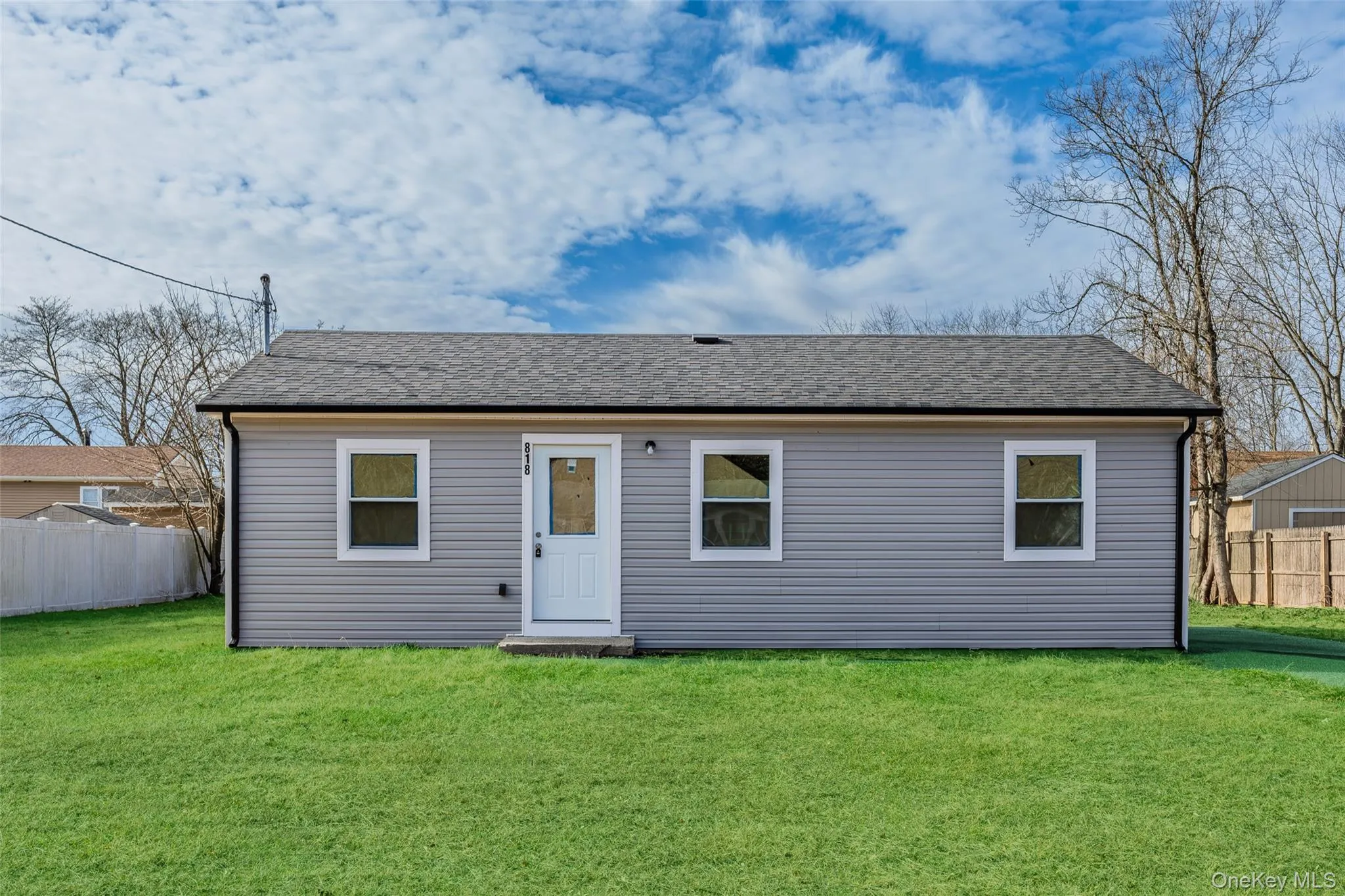 Maintenance free exterior vinyl sided with black gutters gives contemporary flair Maintenance free exterior vinyl sided with black gutters gives contemporary flair
