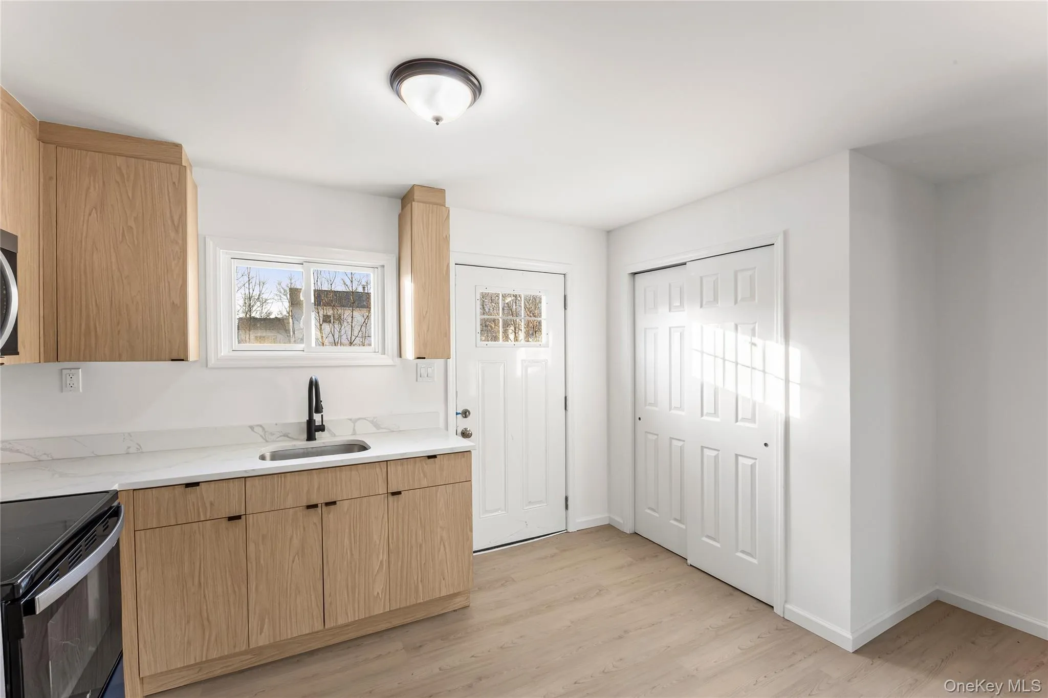 Brand new EIK with soft close cabinetry, Granite countertops and SS appliances. Double closet for storage and W/D hookup Brand new EIK with soft close cabinetry, Granite countertops and SS appliances. Double closet for storage and W/D hookup