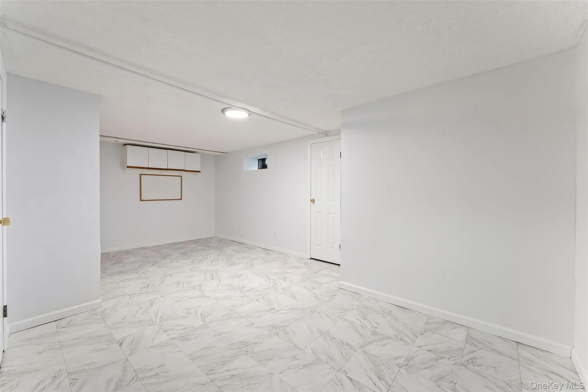 Partially finished basement. (Laundry is in separate part of basement) Partially finished basement. (Laundry is in separate part of basement)