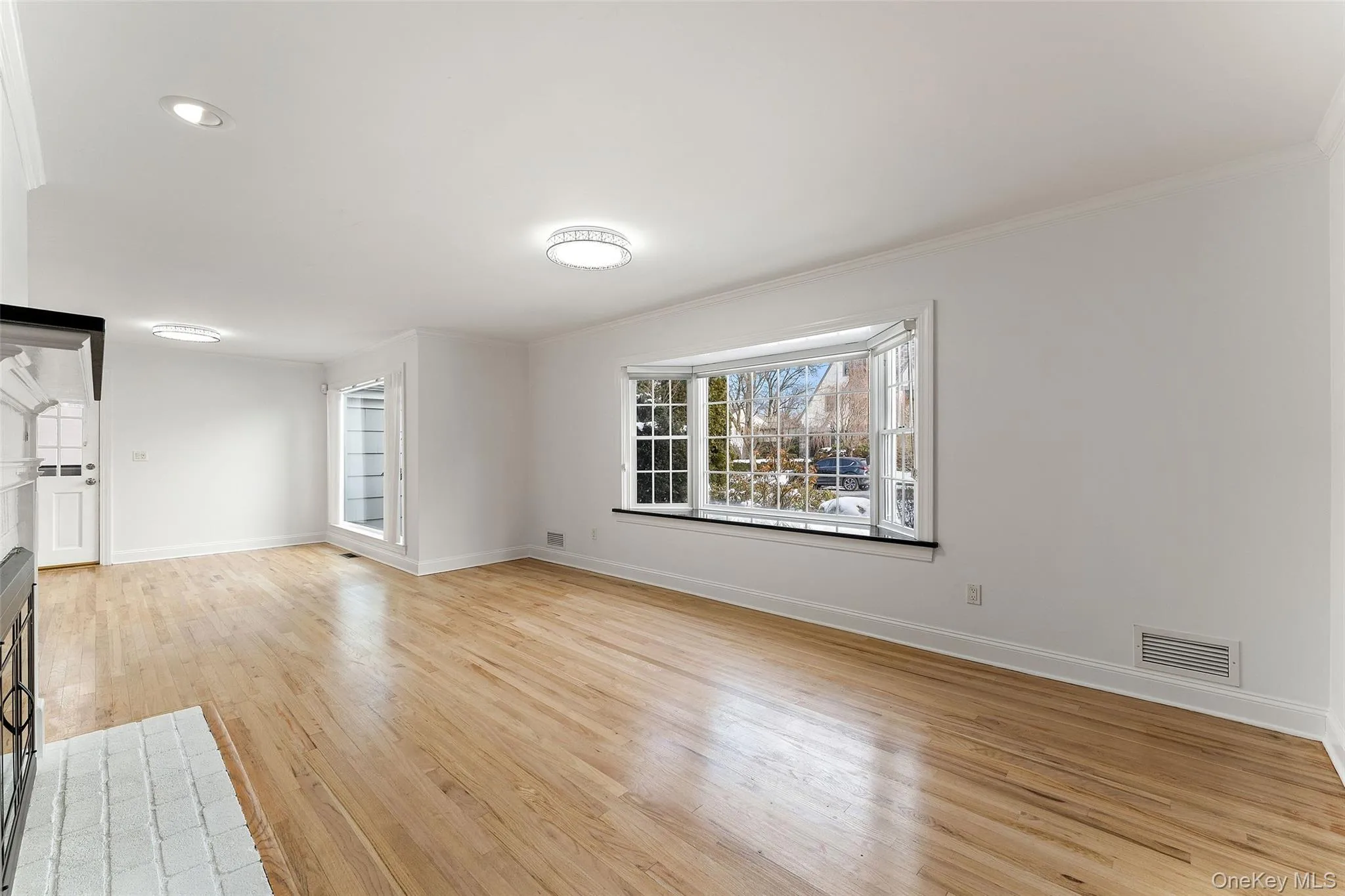 Den with wood burning fireplace. Den with wood burning fireplace.