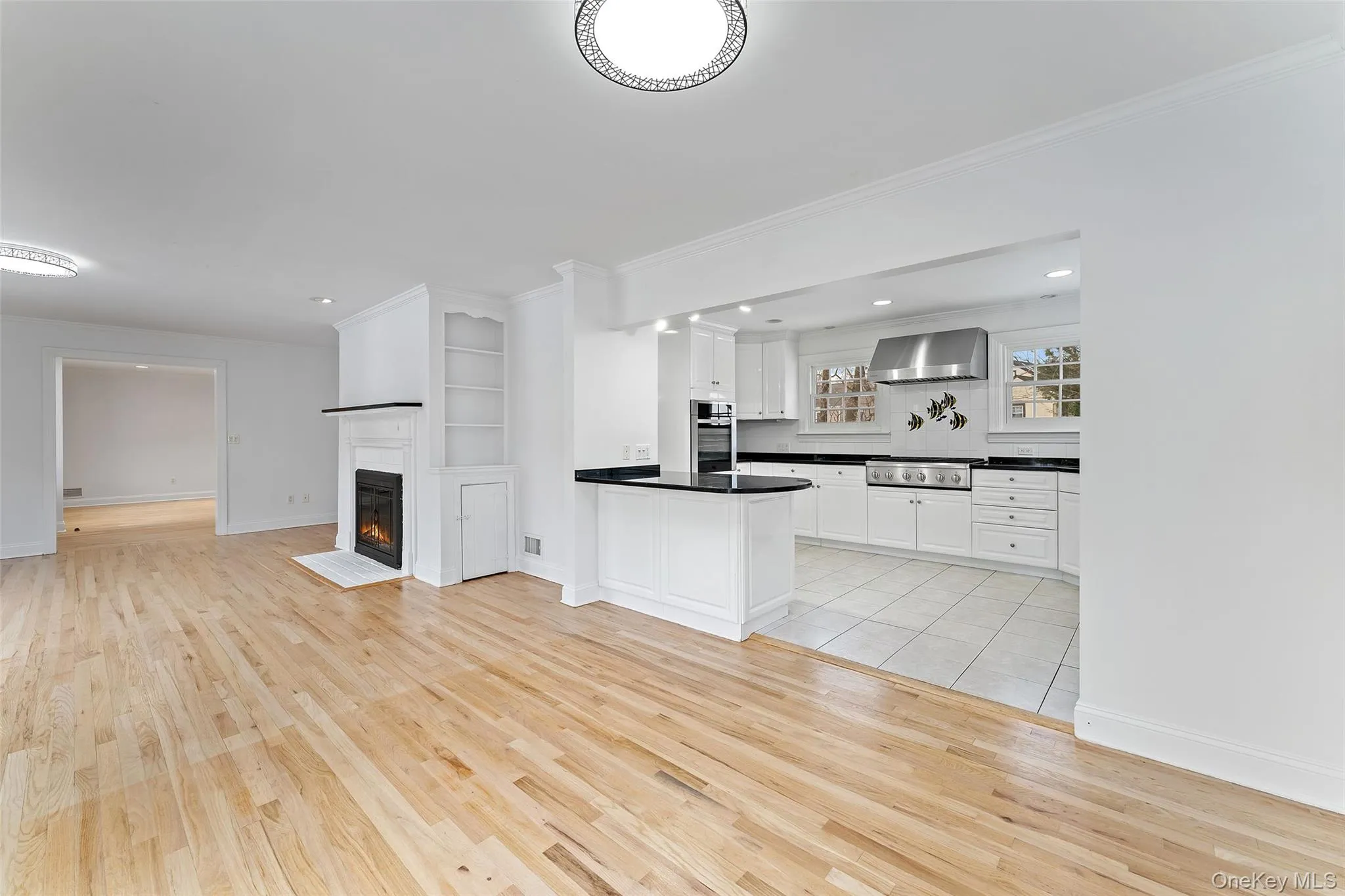 Dining area, kitchen and den - all open flow Dining area, kitchen and den - all open flow