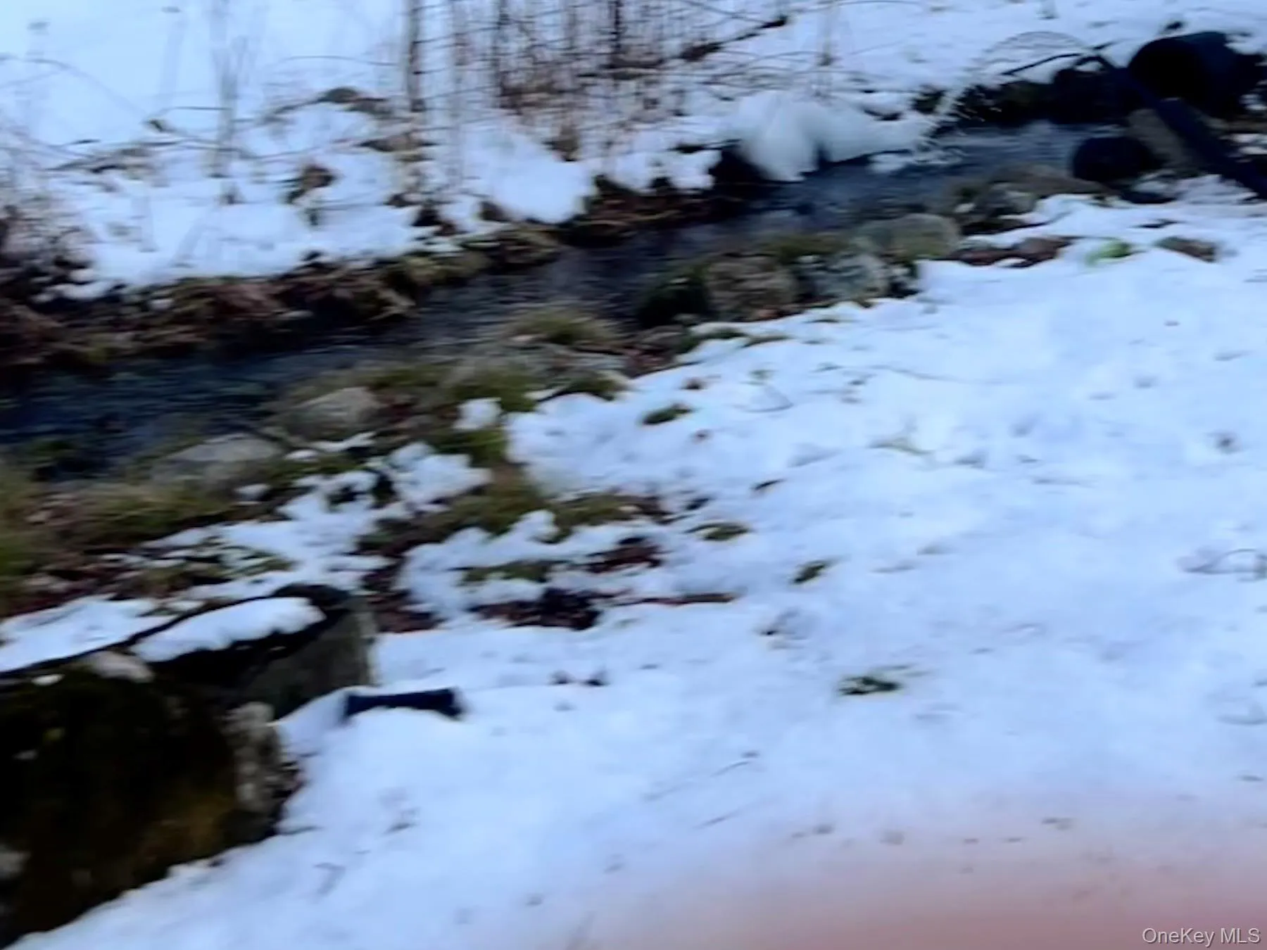 Pretty stream with access to artesian spring water - always at your beckon call. Pretty stream with access to artesian spring water - always at your beckon call.