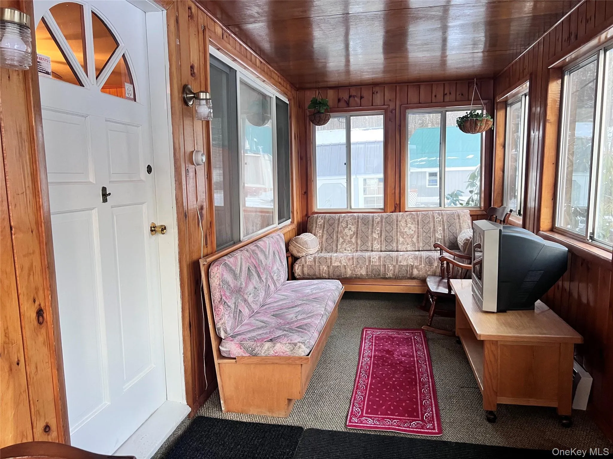 Enclosed porch/sunroom. Enclosed porch/sunroom.