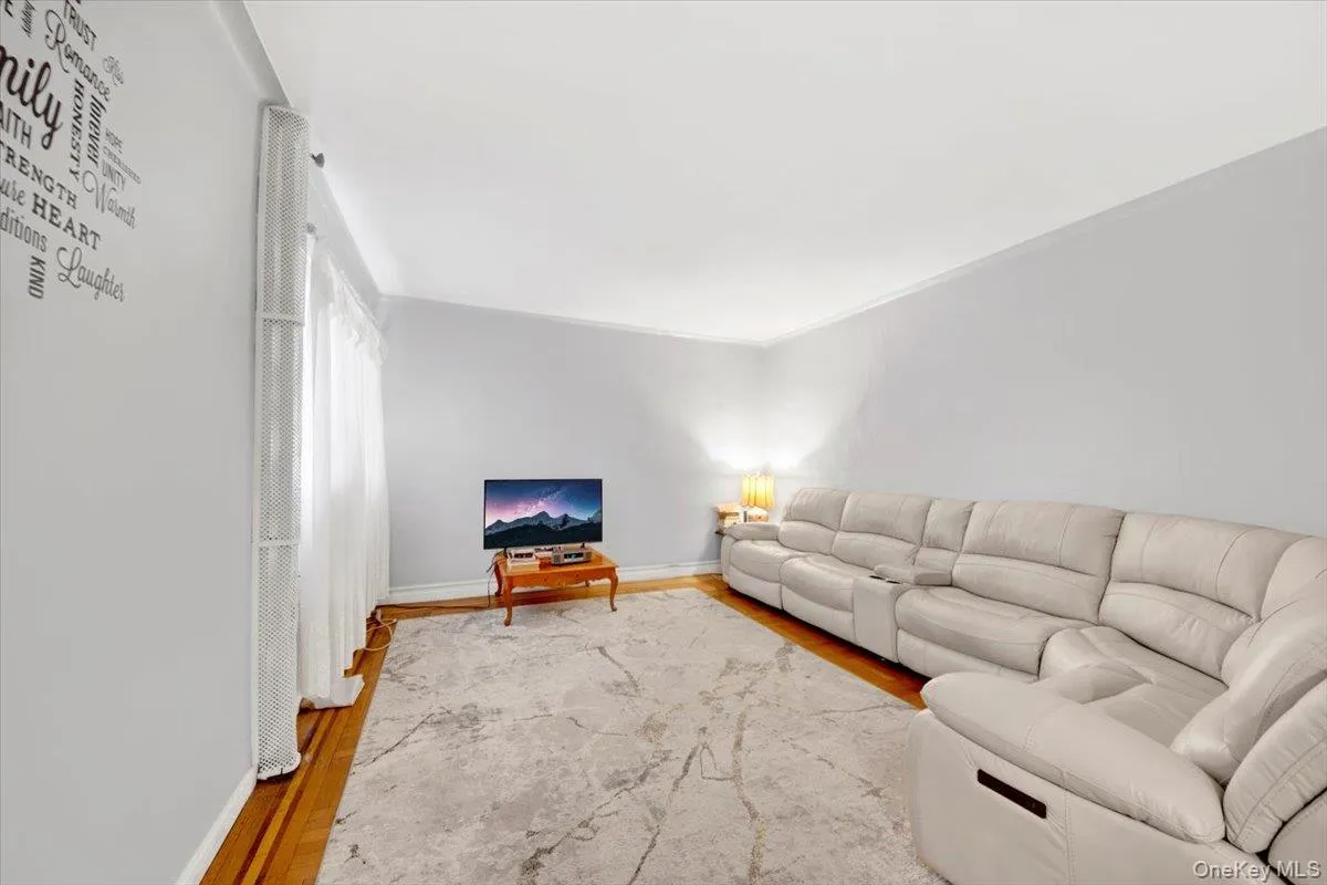 Living area with wood finished floors Living area with wood finished floors