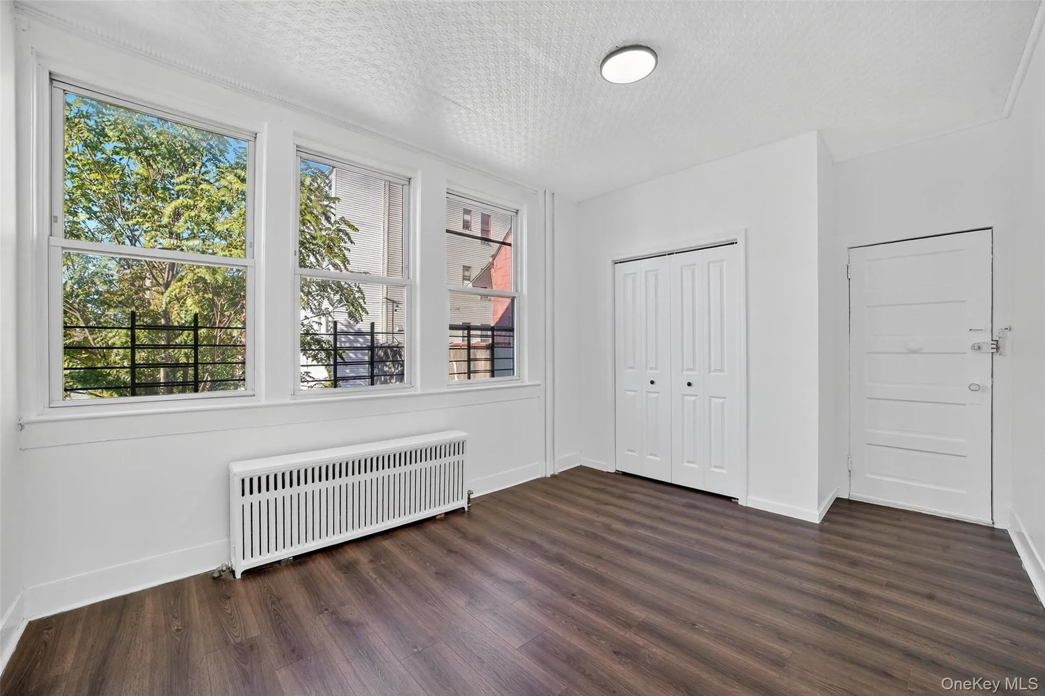 Rear bedroom with ample closet space Rear bedroom with ample closet space