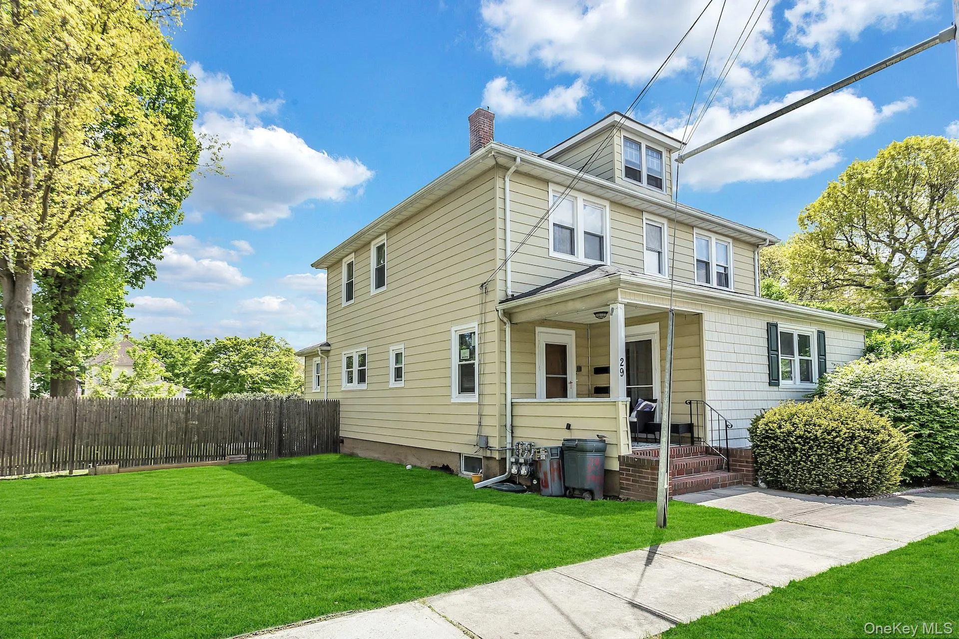 Front of house and porch, side yard Front of house and porch, side yard
