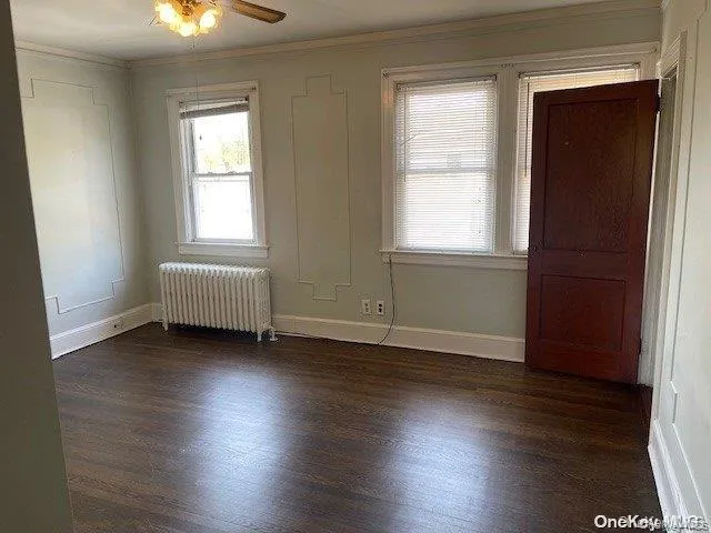Large Living Room with gleaming hardwood floors, tons of natural light and high ceilings Large Living Room with gleaming hardwood floors, tons of natural light and high ceilings