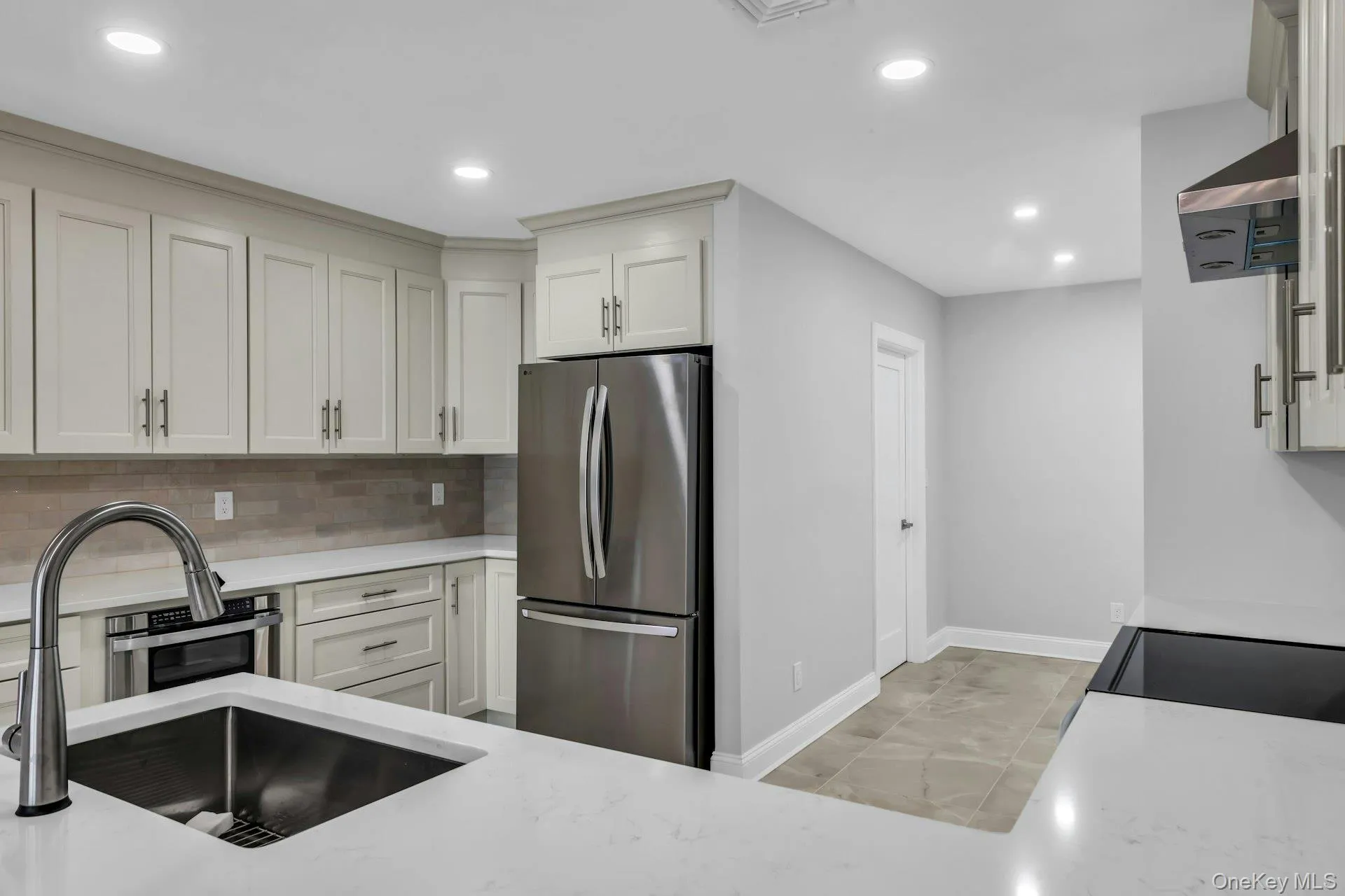 New Chefs' kitchen with custom cabinetry and fixtures, recessed lighting. New Chefs' kitchen with custom cabinetry and fixtures, recessed lighting.