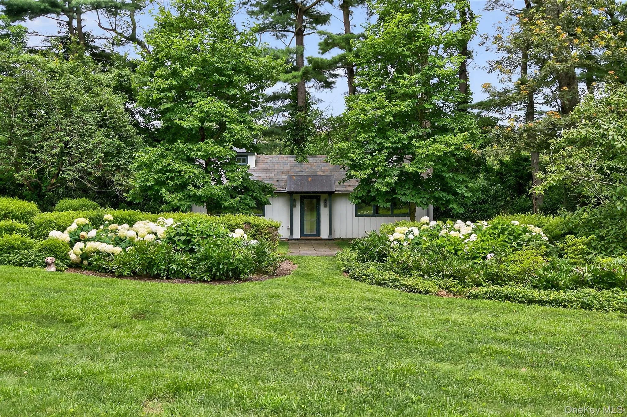 Guest cottage tucked away in the gardens Guest cottage tucked away in the gardens