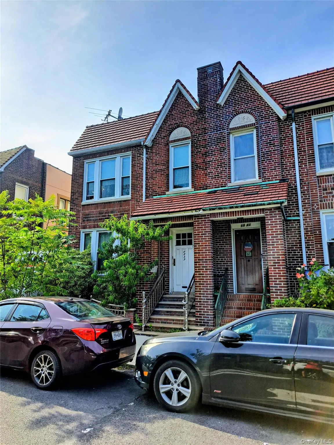 Traditional-style house with brick siding Traditional-style house with brick siding