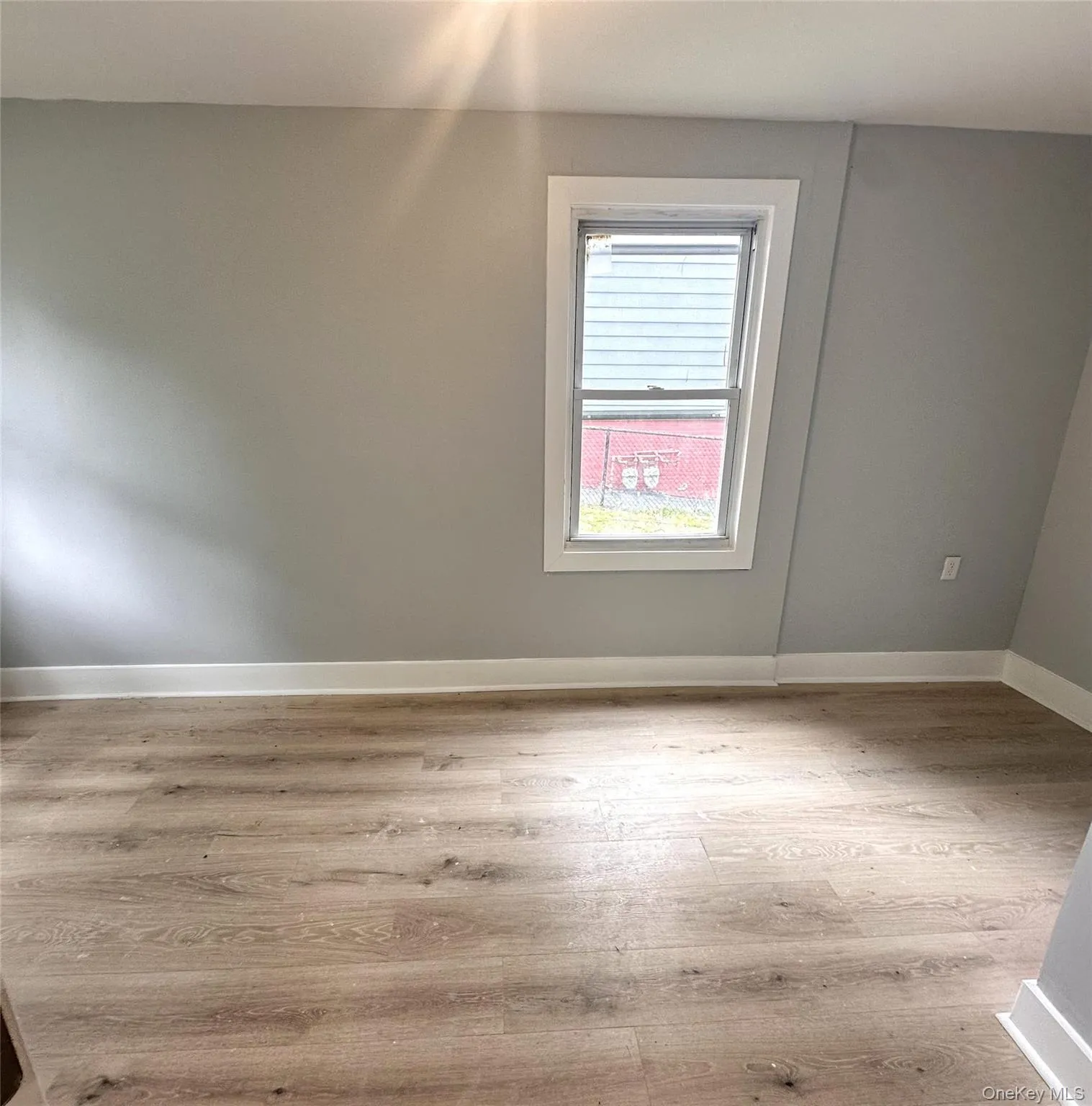 Bedroom one with vinyl flooring, freshly painted and baseboard heating. Bedroom one with vinyl flooring, freshly painted and baseboard heating.