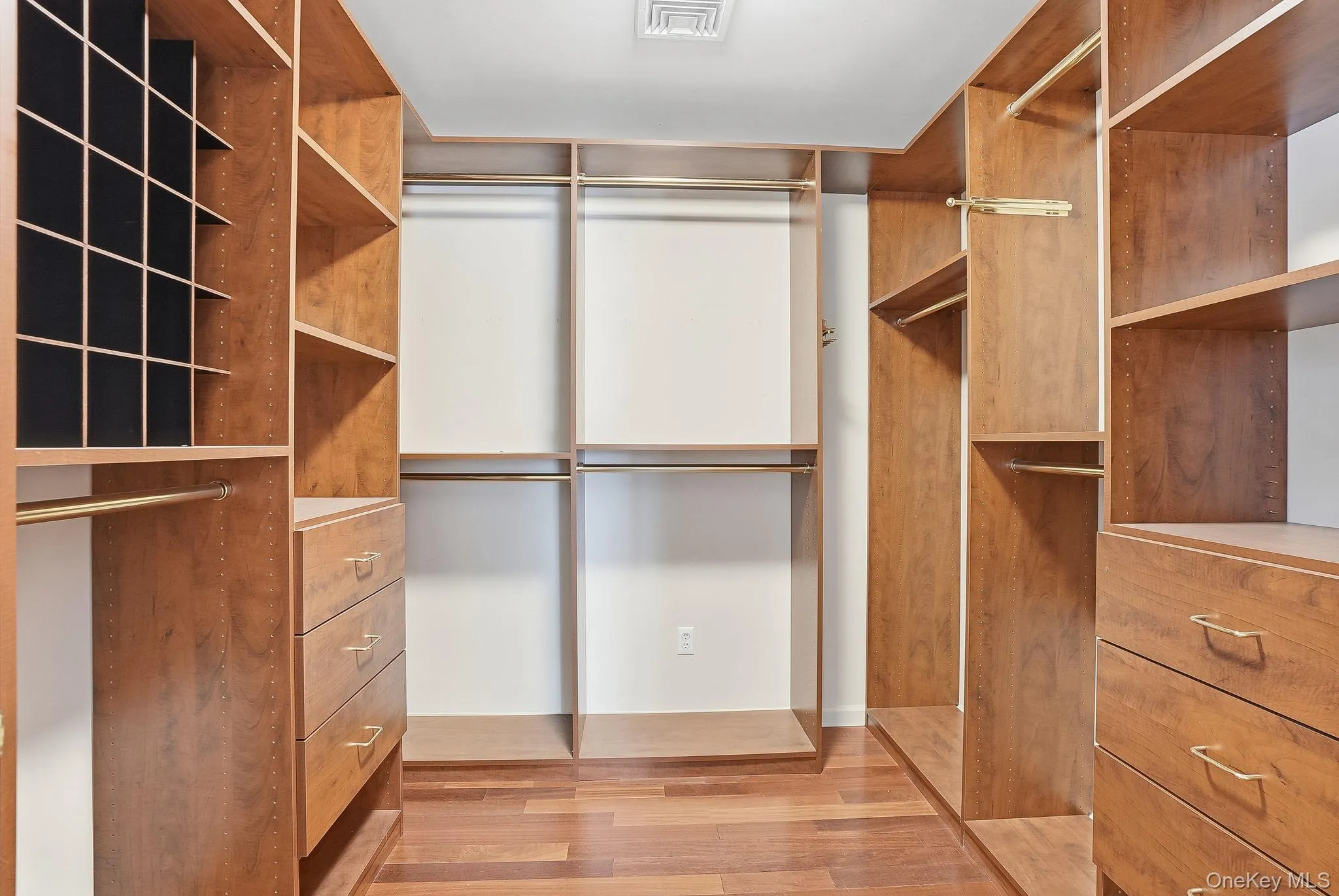 Primary bedroom walk-in with built-ins Primary bedroom walk-in with built-ins