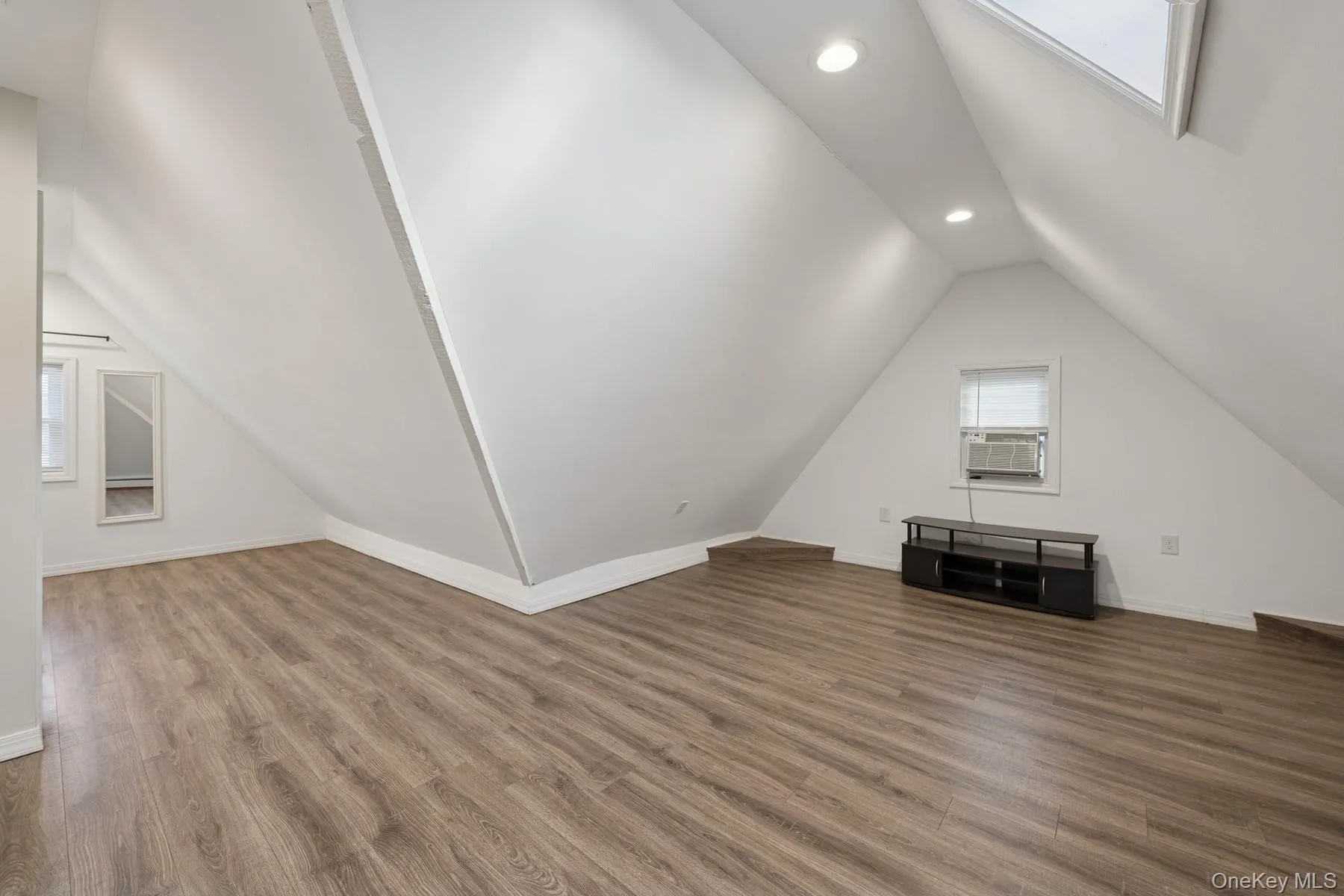 The same primary bedroom with right side sitting area The same primary bedroom with right side sitting area