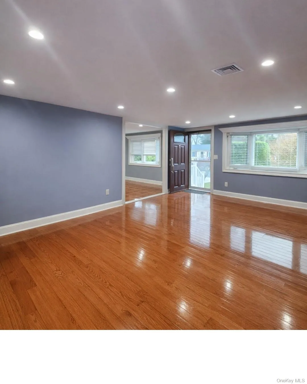 Spare room with light wood-style flooring and recessed lighting Spare room with light wood-style flooring and recessed lighting
